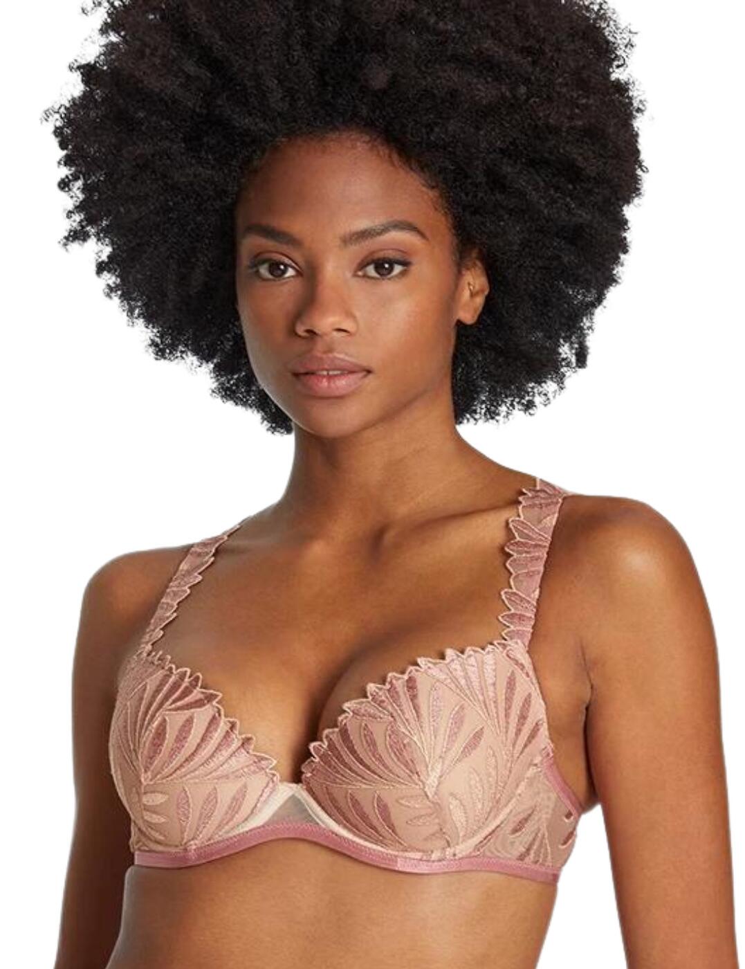 Embody modern luxury with Aubade's Sensory Illusion collection. This iconic collaboration with Aubade and Iris Van Herpen blends nature with fashion-forward innovation as showcased with this elegant plunge bra. Crafted to create a chic silhouette, this piece is designed with a deep plunging neckline that boasts an embroidered leaf-inspired print that adorns the cups and straps. The cups feature underwiring and a padded finish to give your curves the lift and support you crave. Fastened at the back with a traditional hook and eye closure with fully adjustable shoulder straps for a fit you can tailor to your own preference.  Fashion-forward icon Underwired V-opening on centre bust Deep plunging neckline Graduated padding on cups for a seamless look Classic hook and eye closure Fully adjustable shoulder straps Gorgeous leaf-inspired design Country of origin: Tunisia Composition: Cup Embroidery: 60% Polyester &pipe; 29% Polyester &pipe; 11% Elastane Composition: Front Embroidery: 57% Polyester &pipe; 31% Polyamide &pipe; 12% Elastane Composition: Embroidery Back: 44% Polyester &pipe; 41% Polyamide&pipe; 15% Elastane Composition: Lining: 100% Polyester Listed in UK sizes  57015-100860-1306916 RCN08 Plunge Bra