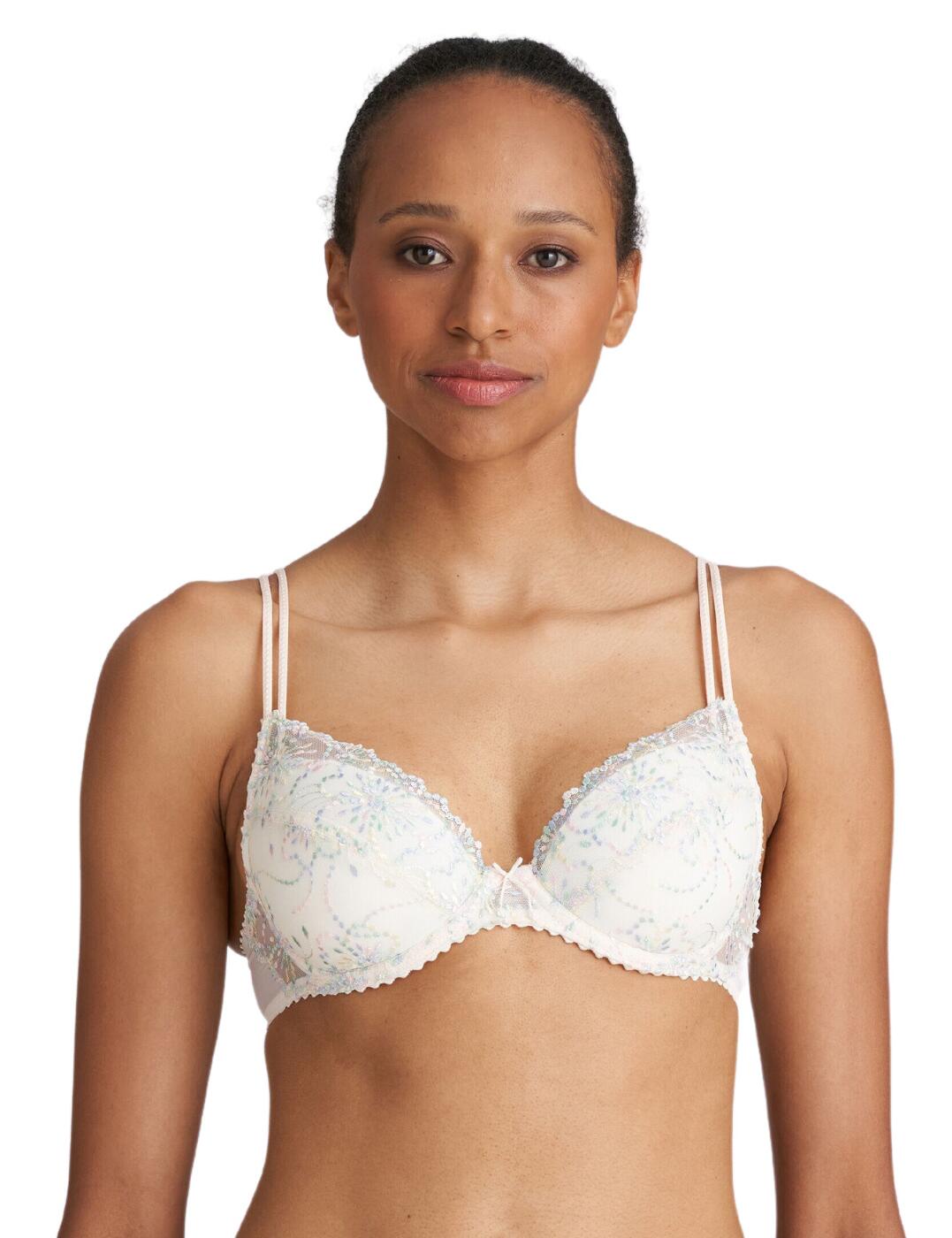 For the sophisticated woman looking for quality lingerie, Marie Jo's Jane push-up bra is a timeless piece worth investing in. Crafted from premium materials, this luxurious number adds instant glamour to your lingerie drawer. It features a delicate scalloped edge detail on the cups and stunning embroidery that brings contemporary edge to traditional designs. Adjustable double spaghetti straps allow you to customize your fit for maximum comfort whilst the hook and eye closure creates a secure fastening. The high apex naturally curves with a lifting boost to emphasise the cleavage. Keep it classic with the bow detail center front, giving an oh-so feminine touch and to the timeless look. Complete the look with chic coordinates from the elegant Jane collection.  Luxury push up bra Padded cups with removable pads Flirty bow detail center front Versatile look with offering of extra boost to support natural curves Delicate scalloped edge detail Dainty double spaghetti straps Luxury design with semi-opaque lace back for comfort Adjustable straps Hook & eye fastening Pair with chic coordinates from this collection Composition: 54% Polyester &pipe; 32% Polyamide &pipe; 14% Elastane Listed in UK sizes  62537-107909-1430588 0101337 Push Up Bra