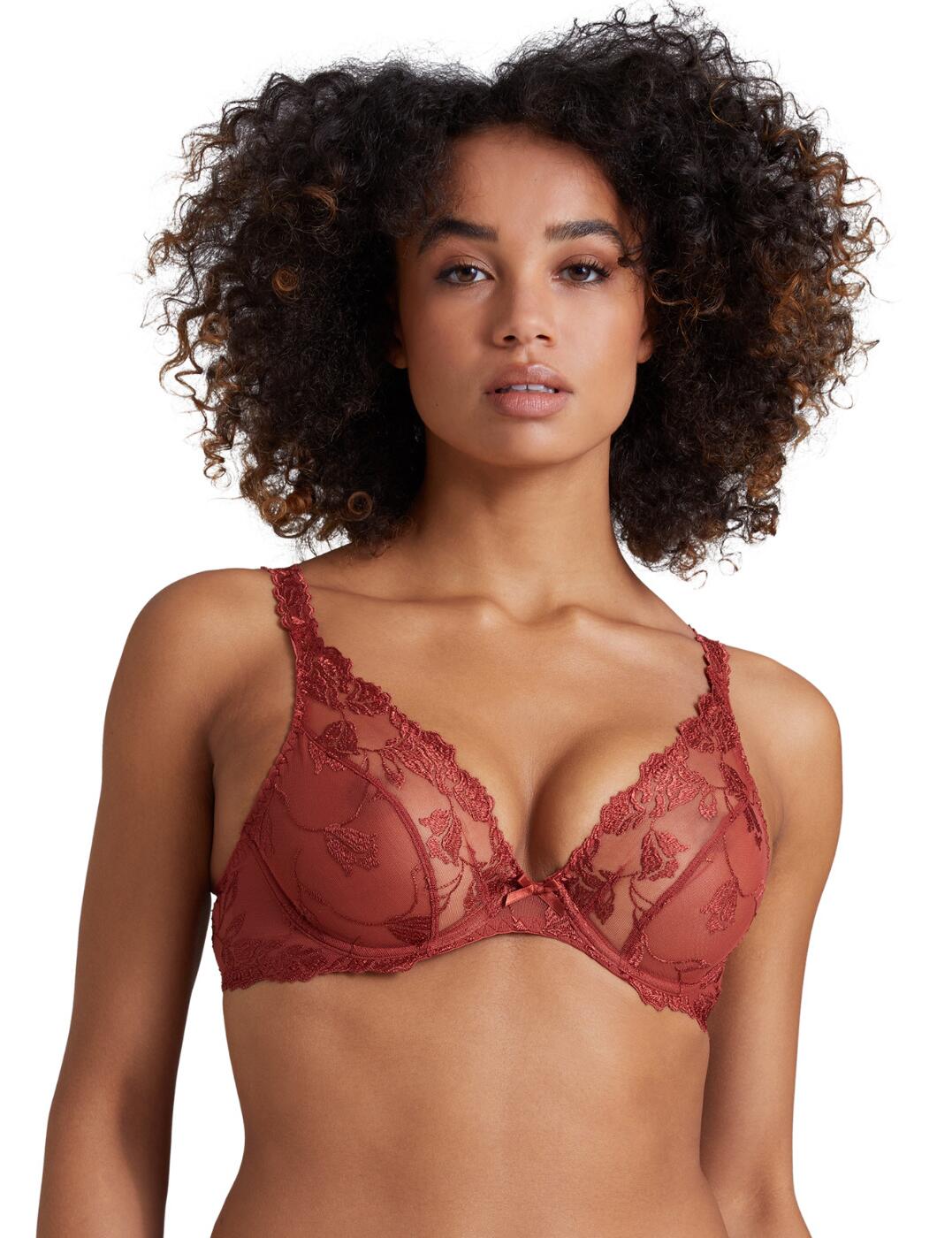 Embody effortless grace with Aubade's Softessence collection this season. This plunge bra falls to a beautiful plunging neckline that accentuates and flatters your gorgeous curves with the cups adorned with delicate floral embroidery to further enhance your natural beauty. This plunge bra features underwiring to ensure your bust is supported and lifted day through night for a look you can wear with complete confidence. Straps are fully adjustable allowing you to alter the fit of this piece to your own preference. Fastened at the back with a traditional hook and eye closure that will have your curves feeling supported all day. A stunning piece that would look divine in your lingerie collection!  A timeless beauty Fully adjustable straps Hook and eye closure Underwired Plunging neckline Non-padded Scalloped lace trim on straps Country of origin: Tunisia Composition: Front Embroidery: 46% Polyamide &pipe; 35% Polyester &pipe; 19% Elastane Composition: Back embroidery: 47% Polyester &pipe; 38% Polyamide &pipe; 15% Elastane Composition: Top cup embroidery: 64% Polyester &pipe; 36% Polyamide Composition: Lining: 100% Polyamide Listed in UK sizes  56188-99775-1308250 TMF12 Plunge Bra