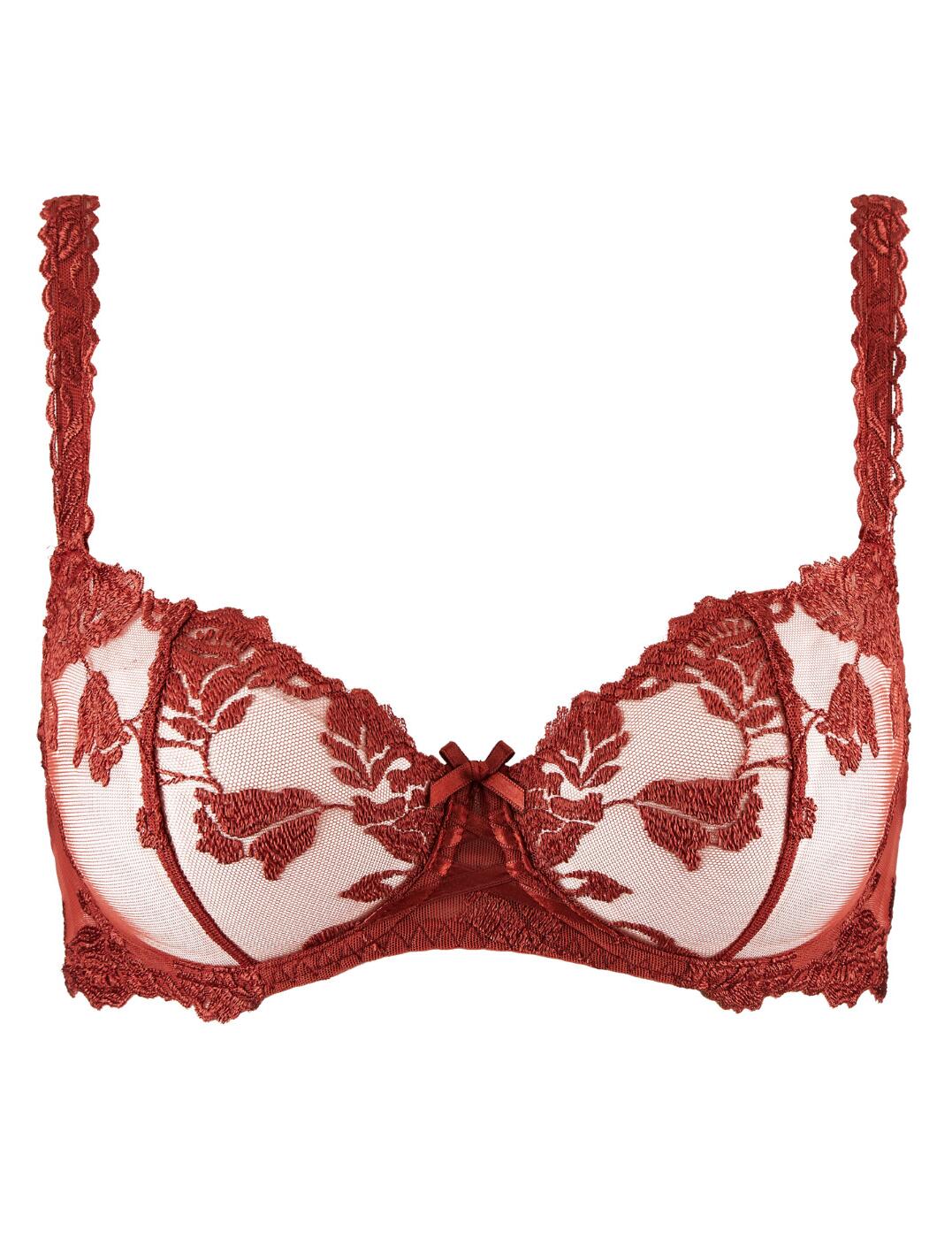 Feel your most seductive self this season with Aubade's Softessence collection. This half-cup bra is crafted with sheer mesh cups that are embellished with sensual feminine embroidery for a truly iconic take on this classic piece. Features a cute satin lattice detailing on the bridge of the bra for a splash of seduction. Cups come to a flattering half-cup design that accentuates your gorgeous curves. This piece is underwired meaning your bust will be supported and lifted day through night. Straps are fully adjustable and this bra is fastened at the back with a traditional hook and eye closure meaning you can tailor the fit of this bra to your own preference. Pair with the available matching items within the Softessence range for the complete set.  Underwired Fully adjustable straps Hook and eye closure Satin lattice detailing on bridge of bra Cute bow on centre front Half-cup design Country of origin: Tunisia Composition: Cup embroidery: 64% Polyester &pipe; 36% Polyamide Composition: Back embroidery: 47% &pipe; Polyester &pipe; 38% Polyamide 15% Elastane Composition: Middle embroidery: 46% Polyamide &pipe; 35% Polyester &pipe; 19% Elastane Composition: Lining: 100% Polyamide Listed in UK sizes  56189-99776-1308265 TMF14 Half Cup Bra