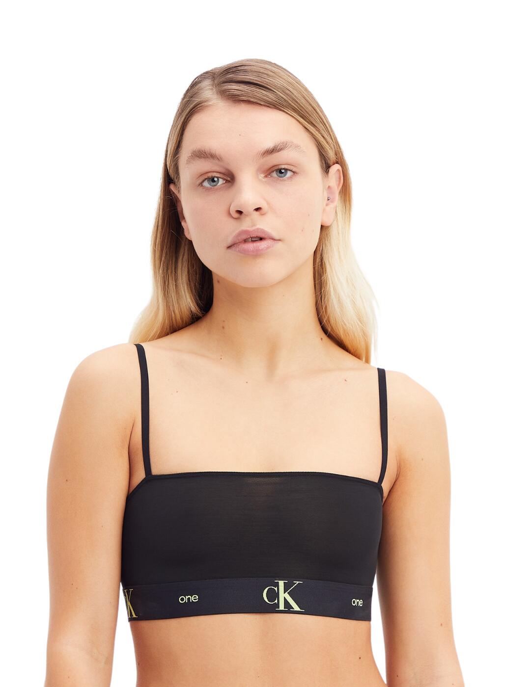 This CK One Mesh bralette from Calvin Klein has an easy pullover design with adjustable shoulder straps for the perfect fit. The sexy semi-sheer mesh fabric offers full coverage but seductively shows a touch of skin beneath. The unlined bandeau bralette design is a non-padded and non-wired design for utmost comfortable fit. It's a very simple design but still stylish enough to flaunt. Wear with matching CK One Mesh briefs for a complete stylish look.  CK One branded underband Pull-over bralette design Adjustable shoulder straps Matching lingerie available Stylish mesh fabric Full cup coverage Non-padded and non-wired Country of origin: Sri Lanka Composition: 68% Polyester &pipe; 32% Elastane Listed in UK sizes  56997-100832-1307580 000QF6958E  Bandeau Bralette