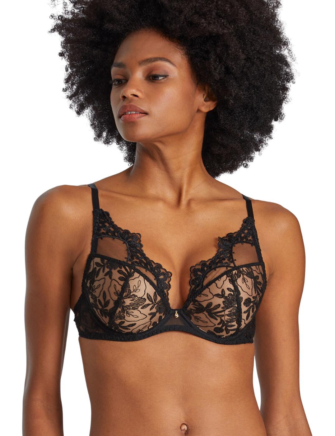 Treat yourself to this shoulder plunge bra from the After Midnight range by Aubade and you seriously won't regret it! This luxurious bra has a half-cup that enhances your bust whilst the plunging neckline showcases your cleavage, it has opaque cups that have a delicately embroidered overlay that creates a high-apex style. The underband also features floral embroidery and has en elegant double-strap features at the back with gold circle hardware detailing for an extra feminine touch. It provides a super comfortable fit with a hook and eye closure and adjustable straps. Matching items are also available for a fully coordinated look.  Plunge bra High apex style Embroidery overlay Half-cups Gold hardware detailing Hook and eye closure and adjustable straps Matching items are also available Country of origin: Tunisia Composition: Embroidery - 73% Polyester &pipe; 18% Polyamide &pipe; 9% Elastane Embroidery top cup - 61% Polyester &pipe; 32% Polyamide &pipe; 7% Elastane Lining - 100% Polyester Cup lining - 100% Polyester Listed in UK sizes  57020-100872-1307168 RIN81 Plunge Bra