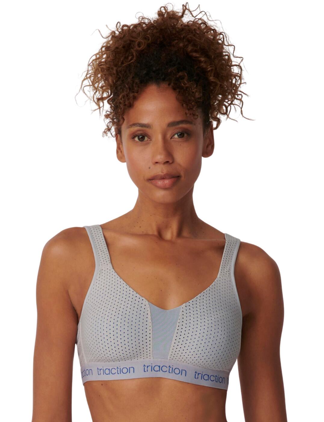 Feeling supported when working out is essential, especially for the bigger busted ladies and this moulded sports bra ensures that with an incredible fit and soft feeling! From the Triaction Energy Lite range by Triumph, this sports bra is crafted to provide optimum support that is perfect for high-intensity sports whilst the sporty mesh allows for a breathable feel and total comfort. It provides full coverage with shaped spacer cups that create a lovely shape without adding volume and is also non-wired but features elastic under band ribbon with branding across. The bra also closes at the rear with a hook and eye closure and has cross-over adjustably padded straps for an individual fit.  Non-wired moulded sports bra Perfect for high-intensity sports Full coverage with shaped spacer cups Sporty mesh for breathability Elastic under band with branding Hook and eye closure Padded cross-over adjustable straps Country of origin: Indonesia Composition: 45% Polyamide &pipe; 41% Polyester &pipe; 14% Elastane Listed in UK sizes  57071-100935-1308473 10201677 Sports Bra