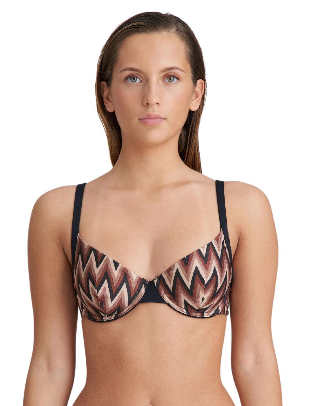 Step into this season with the luxurious Marie Jo Su Ana plunge bikini top. This swimwear brings out your alluring shape for a timeless, chic and super luxe design. The vintage-inspired print and adjustable multiway shoulder straps provide an air of sophistication that can be altered to fit your figure best. This plunge bikini top creates a flattering silhouette while providing support with underwired, non-padded cups and a back clasp fastening for additional security. Whether you prefer to wear this piece with the halterneck style or with the classic shoulder strap look, you'll love this retro-inspired piece that is sure to become part of your swimwear collection.  Flattering plunge bra style Underwired fit Premium stretch material Trend setting retro print Non-padded Multi-way adjustable straps for a personalised fit Secure clip fastening Matching chic coordinates available Composition : 66% Polyester &pipe; 15% Polyamide &pipe; 11% Elastane &pipe; 8% Metal fibre Listed in UK sizes  62706-108111-1434145 1007012 Plunge Bikini Top