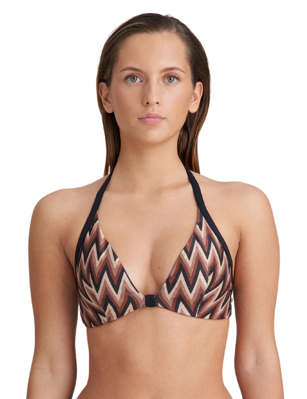 Show off at the pool or beach with the Marie Jo Su Ana padded triangle bikini top. This timeless design features lightly padded cups for a flattering and comfortable fit. Its triangle-shaped wireless cups boast a super luxe design that will bring you 80's vibes for a retro look that never gets old. Style your Su Ana padded triangle bra in a trendy halterneck style with the chic metallic clip fastening ensuring a secure fit. Snap up the matching coordinates for the full groovy look.