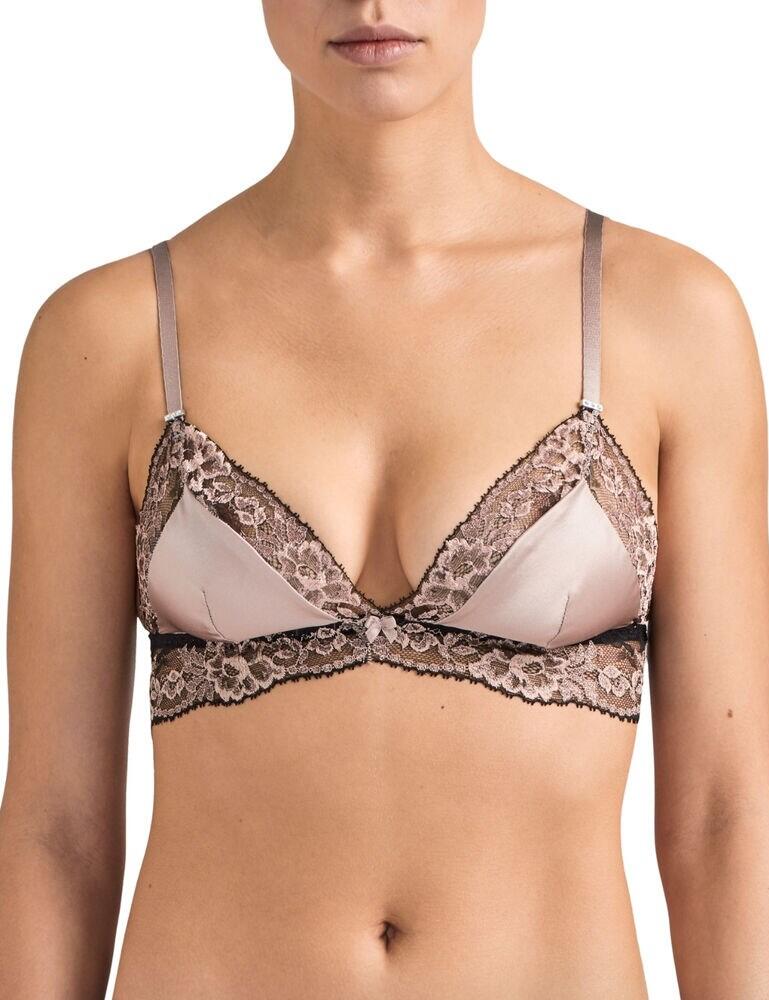Add some luxury to your life with this gorgeous triangle bra from the Femme Glamour range by Aubade. This triangle bra features silky satin cups with lace details around the edges for an extra chic look. This bra is non-wired and non-padded for a very comfortable fit and feel which is perfect for everyday. The spaghetti straps are adjustable for an individual fit and this bra secures at the rear with a hook and eye closure. The popular triangle style offers a plunge neckline for a very flattering look which emphasises your cleavage. Pair with matching items from the Femme Glamour range for a look to wow.  Stunning, feminine design Gorgeous silky satin cups Non-wired and non-padded Adjustable spaghetti straps Secures at the rear with a hook and eye closure Popular triangle style emphasises cleavage Matching co-ordinates available! Composition: 57% Polyamide &pipe; 27% Polyester &pipe; 16% Elastane  Listed in UK sizes  45929-84350-1121241 MD10  Triangle Bra