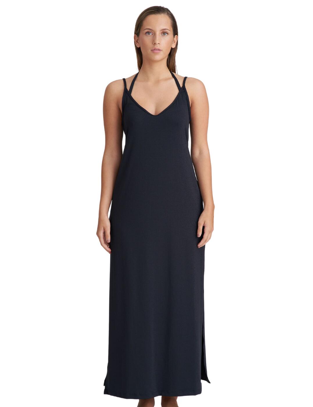 Be allured by the Marie Jo Su Ana maxi swimwear dress - the ultimate beachwear essential that effortlessly exudes holiday vibes and style. Crafted from premium knitted fabric, this versatile cover-up is designed to be light and long, ensuring maximum comfort and a flattering fit for every sophisticated woman. Its airy and breathable material allows you to stay cool under the sun, while offering a more discrete fuller coverage for those moments when you desire a bit of extra modesty. Whether you're strolling along the shoreline or sipping cocktails by the poolside, this dress will effortlessly elevate your beach ensemble.  Light and long fit Relaxed style for holiday relaxation Premium crafted knitted fabric Flattering fit and perfectly covers from the sun Chic matching coordinates available Composition: 81% Polyamide &pipe; 10% Polyester &pipe; 9% Elastane Listed in UK sizes  62755-108162-1435460 1007094 Cover Up