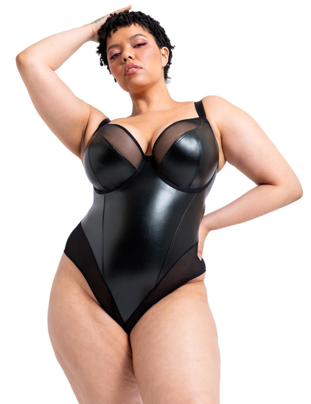 Embrace your bold side with the Rebelle plunge body suit by Curvy Kate. Featuring a non-padded cup, it creates a natural appearance with added support from the underwire. Not only does this bodysuit help with support, but you also look stunning with the plunging cups to show off a bit of cleavage. With a faux leather body and mesh panelling, the body suit contours and accentuates all your beautiful curves. Finally, situated on the crotch of the body suit is a hook and eye fastening keeping you feeling secure whilst wearing.