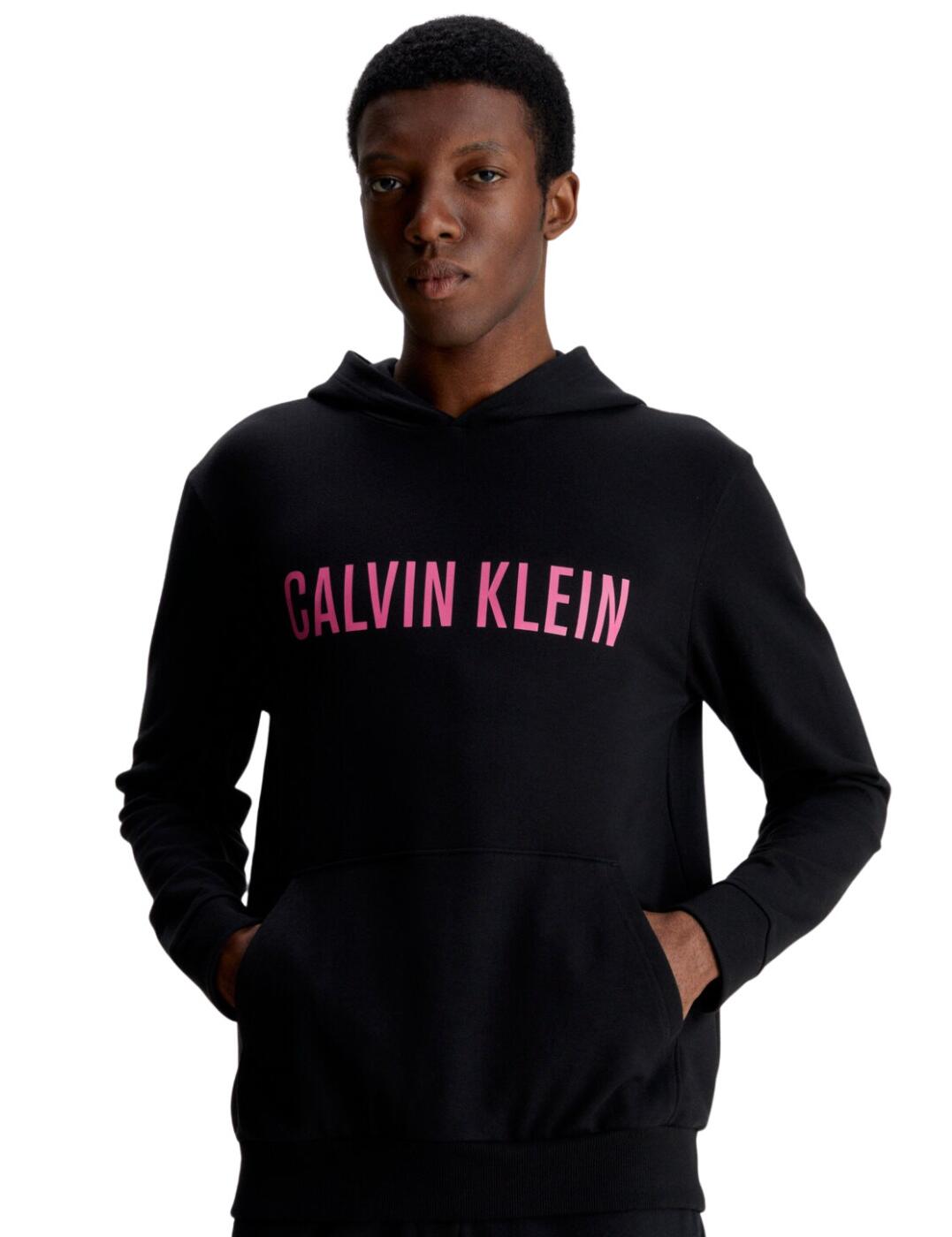 Welcoming the Calvin Klein Mens Intense Power hoodie, a combination of style and comfort designed to keep you looking and feeling your best. With a bold logo across the chest, this hoodie is the perfect addition to any man's wardrobe. Featuring a regular fit and hood, your look is complete. The long sleeves have a ribbed knit cuff around the bottom and sleeves for added warmth and comfort, while the big middle pocket provides more than enough room for all your essentials. Crafted from super soft fabrics this hoodie guarantees maximum comfort and quality. Don't settle for anything less than perfect - choose the Calvin Klein Mens Intense Power hoodie today.  Hoodie A bold logo across the chest Regular fit Hood Long sleeves Middle big pocket Ribbed knit cuff around bottom and sleeves Guarantees comfort Country of origin: Sri Lanka Composition: 57% Cotton &pipe; 38% Polyester &pipe; 5% Elastane Listed in UK sizes  62778-108188-1437536 000NM1966E Men's Hoodie