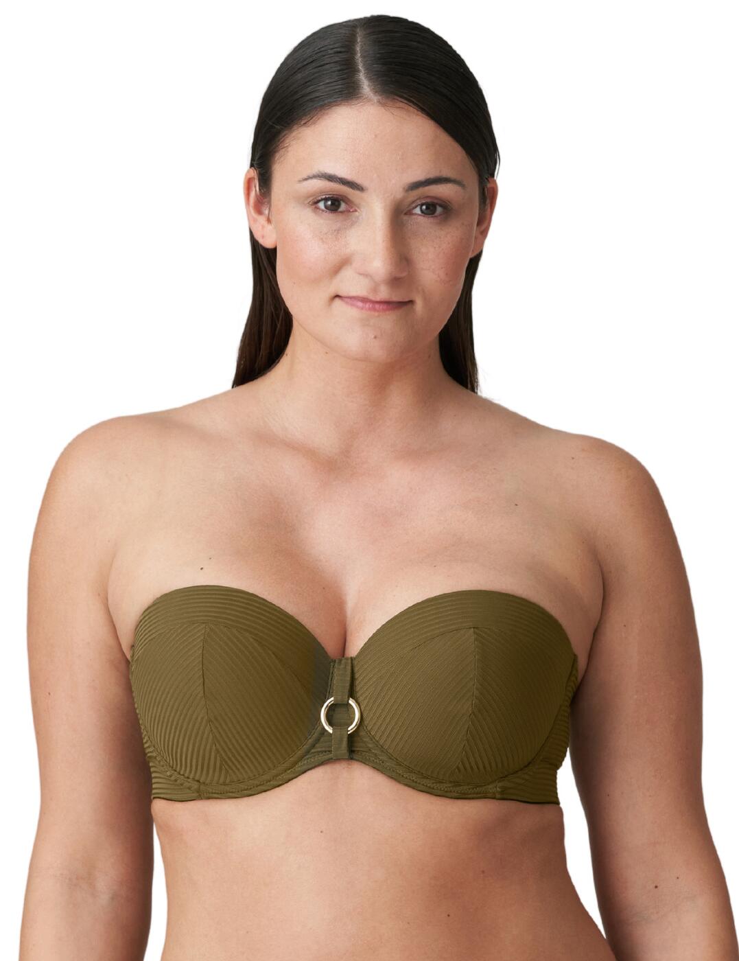 Put a glamorous finishing touch on your bikini look with the fashionable Prima Donna Sahara strapless bikini top! This strapless bandeau style is designed with a trendy retro style and balcony neckline that will flatter all body types. Underwired for comfort and support, the bikini top is crafted from a ribbed terry fabric for durability. An eye-catching golden-plated ring detail at the centre front adds a shimmering highlight to complete the look. Moreover, you'll stay extra secure with its removable and adjustable shoulder straps. And why not pair with one of the matching coordinates for a complete look?