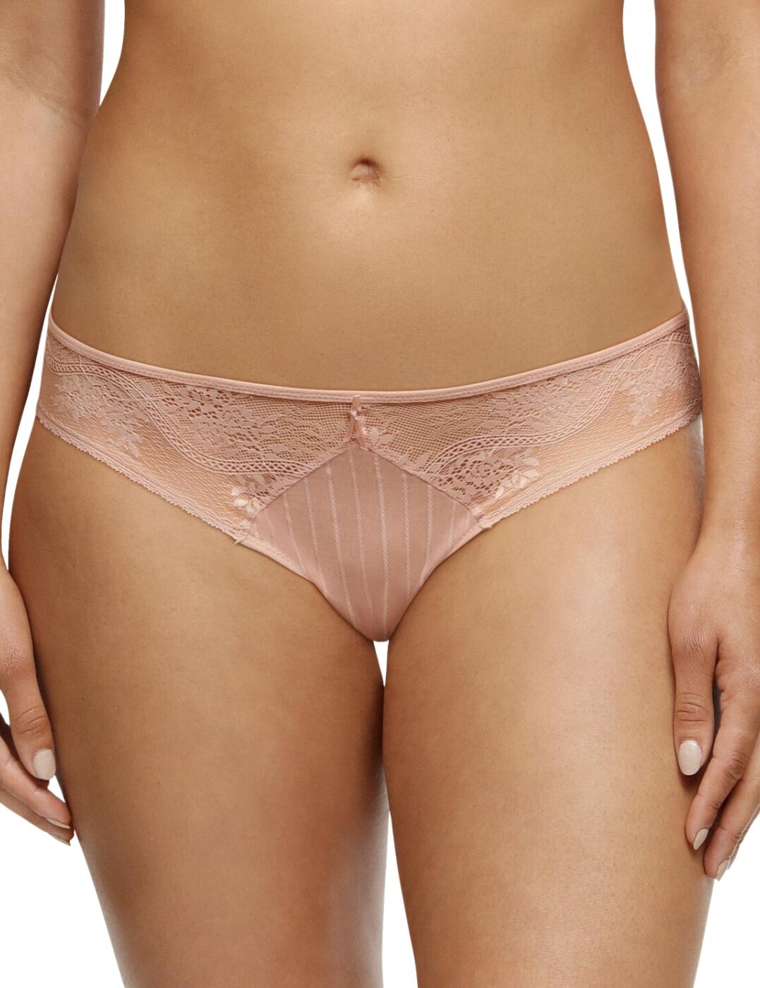 This luxurious everyday Brazillian brief from the Maddie range by Passionata by Chantelle will bring style and elegance to any lingerie collection. Striped cotton tulle lining the front of the brief contrasts with floral lace inlay at the sides, combining with the bow at the front of the brief to create a truly feminine and sophisticated look. The low-rise waist and moderate rear coverage accentuate your curves. To complete this look, snap up the matching lingerie available from this gorgeous range.  Luxurious floral lace Bow detail Low-rise waist Moderate rear coverage Matching lingerie available Country of origin: Tunisia Composition: Lace: 78% Nylon &pipe; 22% Elastane Composition: Knit: 78.5% Nylon &pipe; 21.5% Elastane Composition: Gusset: 100% Cotton Listed in UK sizes  61670-106822-1414034 P47H30 Brazilian Brief