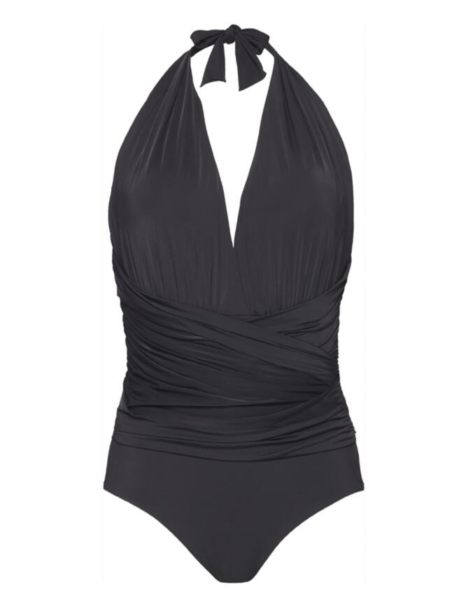 Hit the beach in this chic Shape Classic swimsuit by Calvin Klein. This super-flattering swimsuit features a deep v-neckline for a seductive cleavage whilst offering excellent tummy control, sinching you in at the right places allowing for a contoured look. The popular halterneck tie allows for an individual fit. This design allows for great rear coverage and has a lower leg opening for additional coverage. Add this reserved yet sexy swimsuit to your swimwear collection!  Chic and feminine design Sensual plunging neckline Popular halterneck style Flattering draping at the waist Padded cups Composition:84% Polyamide &pipe; 16% Elastane RRP £120.00 Listed in UK sizes  43190-79116 KW0KW00283094  Swimsuit 