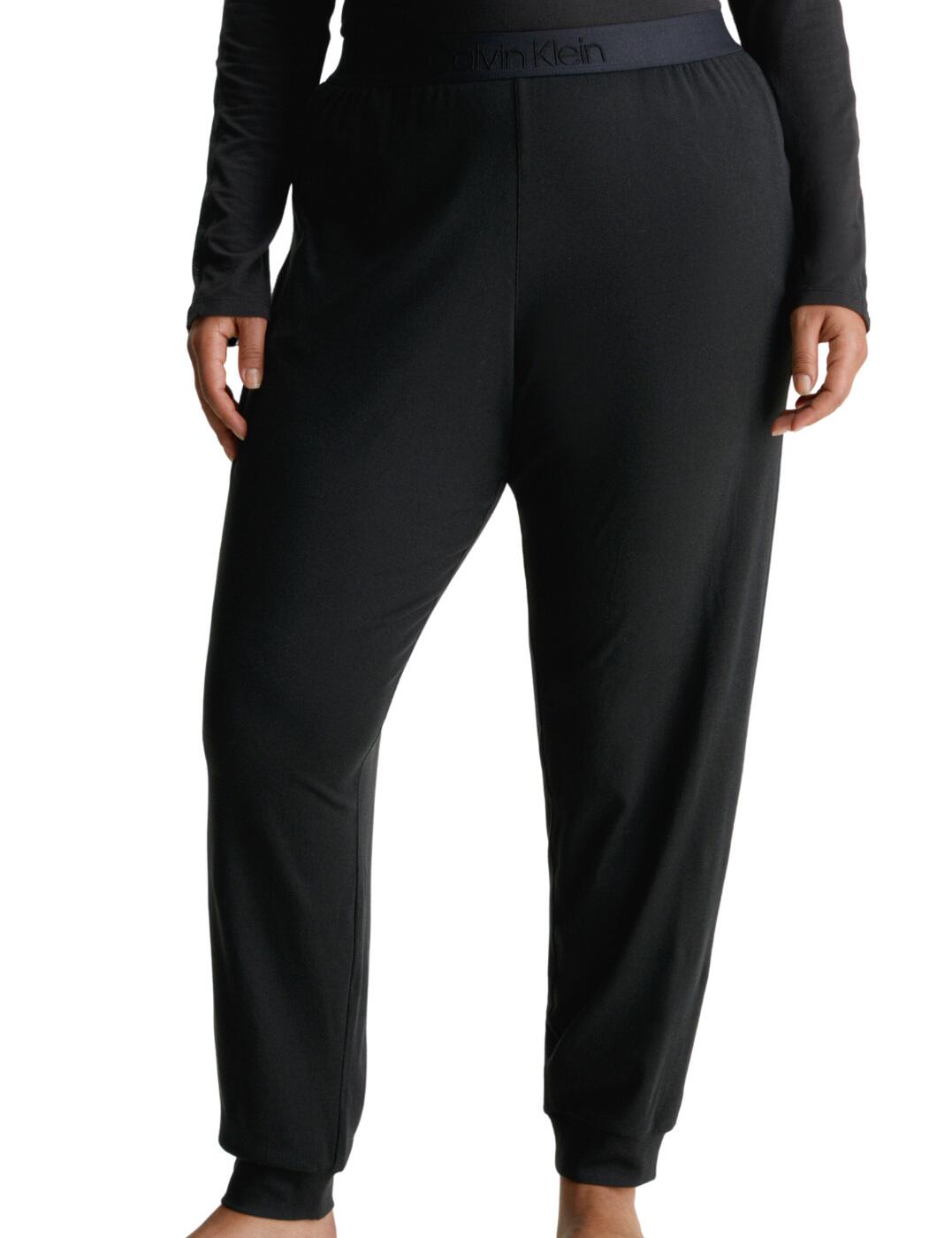 For the fashionista in all of us, the Calvin Klein Intrinsic Sleep joggers will be your go-to loungewear piece. Crafted from a soft and breathable fabric, these joggers not only look stylish, but are also incredibly comfortable and cozy. They’re perfect for lounging around the house, or running errands. And, that signature Calvin Klein waistband? Completely iconic! The cuffed ankles add the perfect finishing touch, too.  Cuffed ankles Full length Calvin Klein elasticated waistband Sleek and comfortable Country of origin: Sri Lanka Composition: 58% Cotton &pipe; 38% Modal &pipe; 4% Elastane Listed in UK sizes  62882-108310-1436985 000QS7004E Loungewear