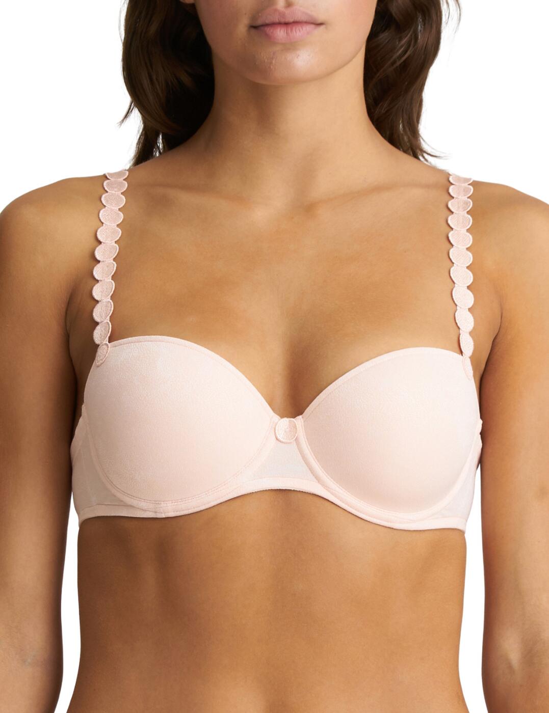 The classic design of this Tom bra from Marie Jo is sure to please any elegant lady. The smooth material will stay invisible under clothing, while the balcony-style design will shape your bust and create a feminine figure. The padding and underwiring of the cups will support your chest and help with moulding your look. To offset this simplistic design, the bra features an intriguing round pattern on the adjustable straps, with a matching round detail in between the bust.  Classic balcony bra Smooth material Adjustable multiway shoulder straps Hook and eye back closure Underwired Padded Country of origin: China/Nanhai Composition: 53% Polyester &pipe; 28% Polyamide &pipe; 19% Elastane  Listed in UK sizes  53961-97495-1264534 0120829 Balcony Bra