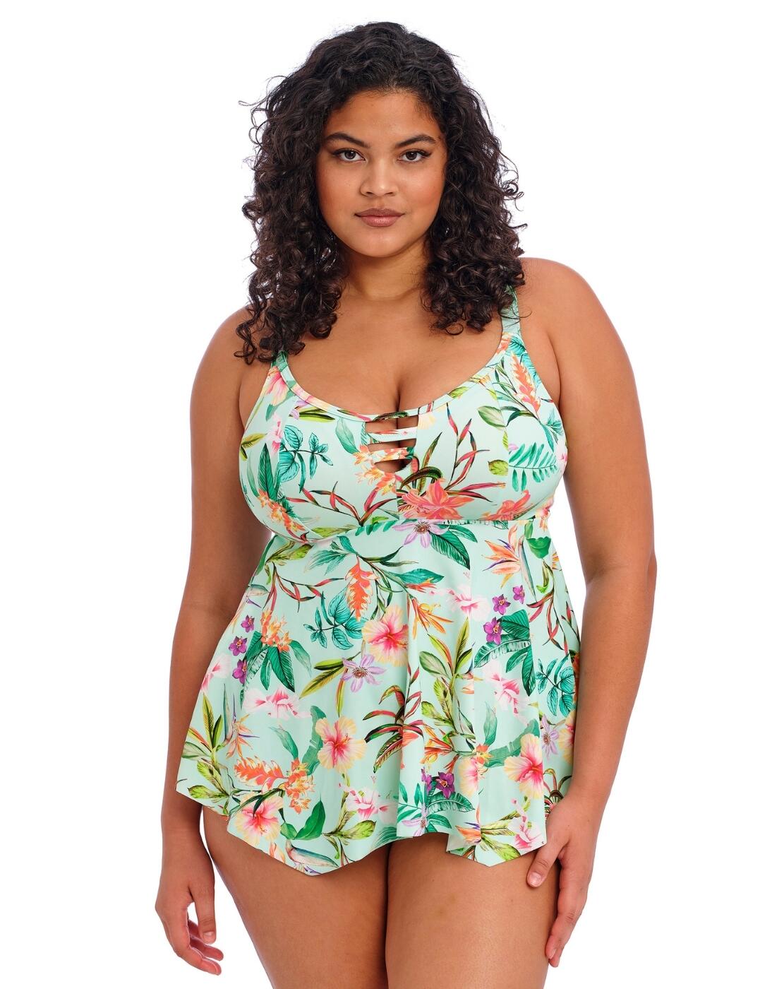 Look forward to feeling the beachy breeze in this gorgeous Elomi Sunshine Cove non-wired tankini top! This beautiful tankini top is cut from printed fabric with LYCRA® XTRA LIFE™ and has a tropical flower print that's sure to turn heads. It has a scooped neckline for full cup coverage, non-wired construction to ensure maximum comfort and non-padded cups to keep your natural shape. The bust area is lined with light foam cups and it also features adjustable shoulder straps as well as an upper back panel with powernet lining for extra support. Plus, you'll love the centre front cutouts with strapping detail and gently flared tankini shape falling to a handkerchief-style hem. Whether you're looking for a two-piece set or want to mix and match various pieces - there are also matching coordinates available so you can find the style that best suits your needs.  Moulded tankini top Scooped neckline Full cup coverage Tropical flower print Non-wired for comfort Non-padded for natural shape Gently flared tankini shape Handkerchief style hem The Bust area is lined with light foam cups The upper back panel has powernet lining Center front cutouts with strapping detail Cut from printed fabric with LYCRA® XTRA LIFE™ Adjustable shoulder straps Pull-on design Matching coordinates available Country of origin: Indonesia Composition: Cup Lining: 100% Polyester Composition: Main Fabric: 80% Polyamide &pipe; 20% Elastane Composition: Wing Lining: 86% Polyamide &pipe; 14% Elastane Listed in UK sizes  61947-107205-1419179 801861 Non-Padded Tankini Top