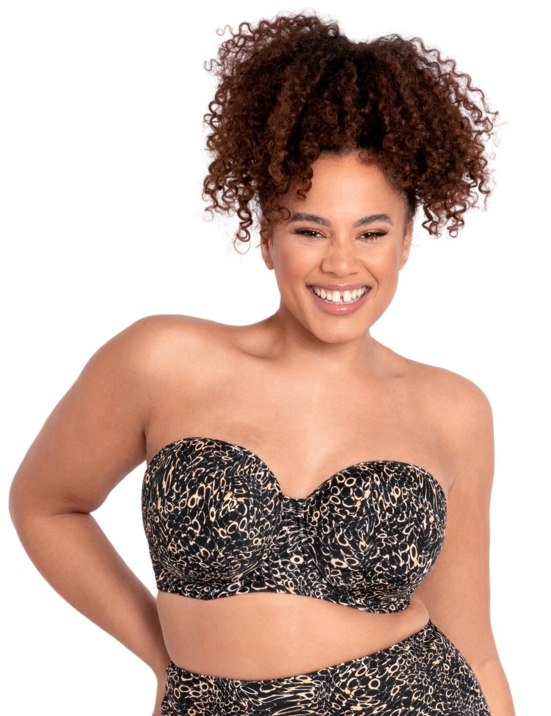 Show off your beautiful figure in style on the beach with this Eclipso bandeau bra from Curvy Kate. The classic style can be worn as a bra with shoulder straps in 3 different combinations, or the straps can be removed completely and you can show a bit more skin wearing it as a trendy strapless design. The underwire and elastic material support and shape your bust, making sure that you are comfortable and the bandeau stays right where you want it.  Balcony-style neckline Smooth elastic material Adjustable and detachable multiway shoulder straps Swimwear clicker back closure Underwired Wear with matching coordinates Country of origin: China Composition: Main - 80% Nylon &pipe; 20% Xtra Life Lycra, Lining - 100% Polyamide, Lining 2 - 100% Polyester, Wing Mesh - 75% Polyamide &pipe; 25% Elastane Listed in UK sizes  53969-96653-1253998 CS022307 Balcony Bikini Top
