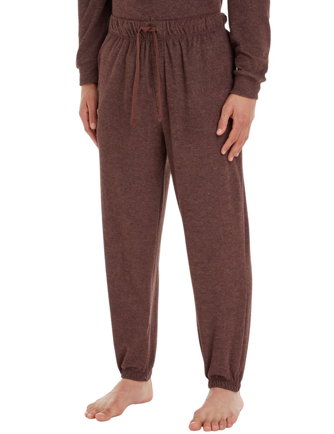 Calvin Klein has done it again: introducing the new men's joggers. Crafted from an incredibly soft and cosy fabric, these joggers offer an unbeatable level of comfort. Slip into your new joggers for instant relaxation. Featuring a regular fit and cuffed ankles, they are designed to fit like a dream. The elasticated drawstring waist and side pockets create a unique tailored effect and add a practical aspect to this luxury item. To complete the look, why not pair it with the matching hoodie for an athletic look that won't sacrifice an ounce of comfort.  Joggers Soft cosy fabric Regular fit Cuffed at the ankles Elasticated drawstring at the waist Side pockets Comfortable fit A matching hoodie is also available Country of origin: Sri Lanka Composition: 60% Cotton &pipe; 40% Polyester Listed in UK sizes  62915-108347-1437526 000NM2449E Men's Joggers