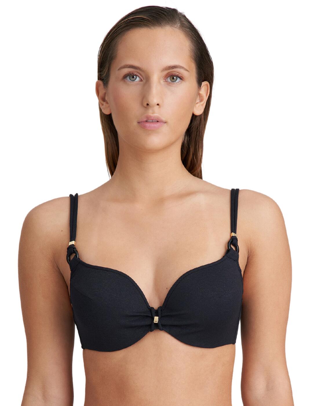 Feel confident and fashionable when you hit the beach in the gorgeous Marie Jo Dahu heartshaped bikini top! This stunning bikini top is designed with a shimmery heartshaped detail to make you stand out from the crowd in style. The soft, padded cups provide ultimate comfort and support while the wired technology gives you that extra boost of confidence. The adjustable shoulder straps can easily be worn as a halter so you can customise your look with ease. With a sophisticated ring detail on the straps, this bikini top is the perfect holiday accessory. Plus, it comes with matching swimwear so you can create a chic and harmonious look. Make a statement with the Marie Jo Dahu heartshaped bikini top this season!  Beautiful heartshaped bikini top Padded cups Underwired Clip fastening Adjustable shoulder straps that can also be worn as a halter Shimmery design Ring detail on the straps Matching swimwear available Composition: 57% Polyamide &pipe; 35% Polyester &pipe; 8% Elastane Listed in UK sizes  62950-108382-1438315 108382 Padded Plunge Bikini Top