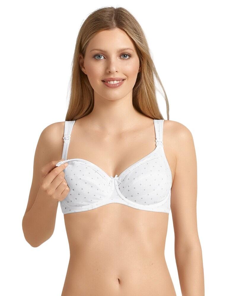 Feel comfortable and supported during breastfeeding months in this underwired nursing bra from the Miss Cotton range by Anita Maternity. This bra features a pretty, subtle polka dot print which is further complimented by a dainty bow for a pretty look. This bra is underwired for support and uplift and equally non-padded for a natural fit and feel. This bra has discreet nursing clips which open the cup and make breastfeeding a breeze. The comfort straps are wide for comfort and support and are also adjustable, allowing you to find an individual fit. This bra secures at the rear with a hook and eye closure. Make sure to add this essential to your maternity lingerie collection.  Anita Maternity are specialists in maternity wear Pretty polka dot print Dainty bow Underwired for support and uplift Non-padded cups Discreet nursing clips open the cup Wide, comfort, adjustable straps Secures at the rear with hook and eye closure Composition: 70% Cotton &pipe; 15% Nylon &pipe; 10% Polyester &pipe; 5% Elastane Listed in UK sizes   46358-85082-1133644 5056 Nursing Bra