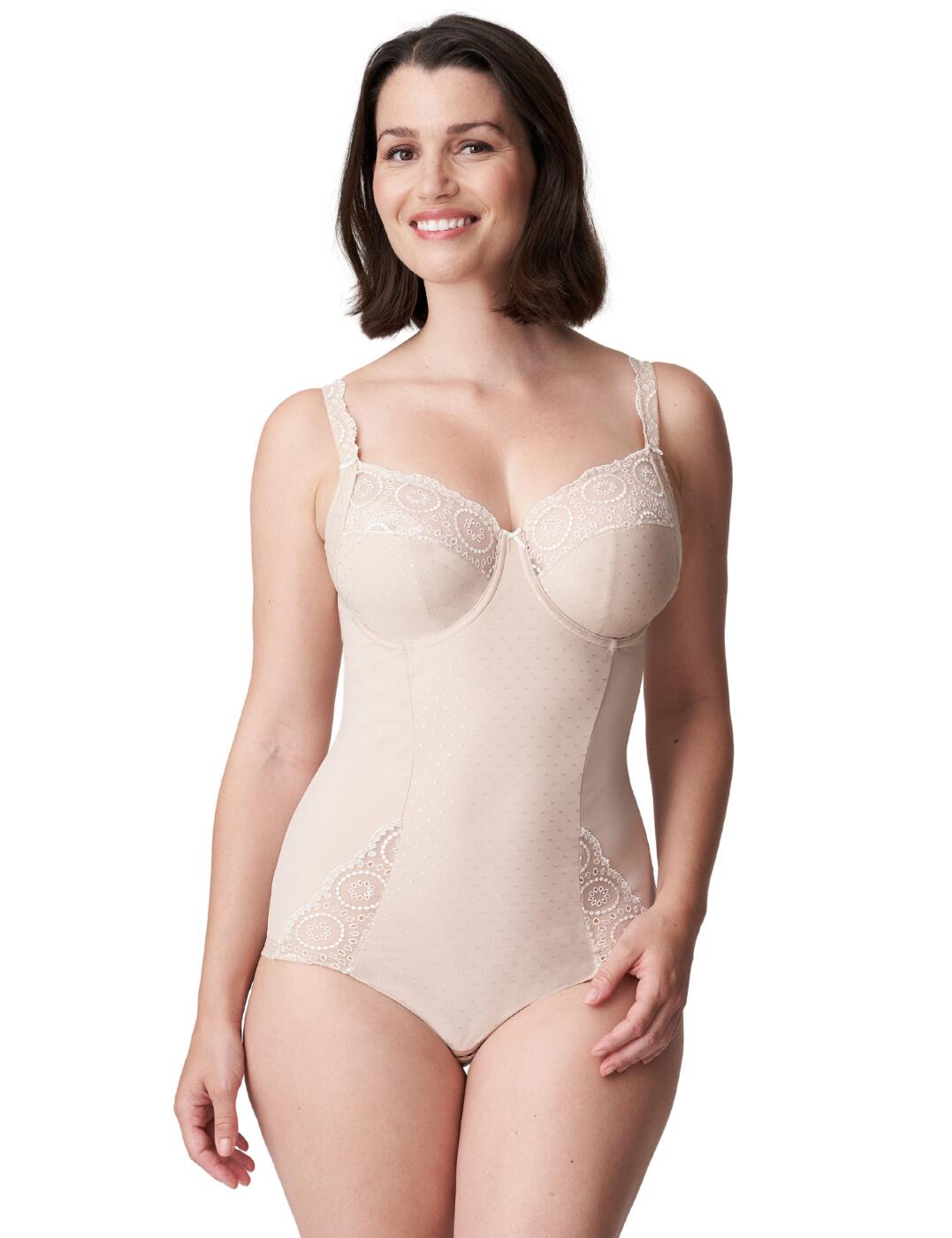 The Osino collection from Prima Donna offers the utmost luxurious everyday lingerie with a classic elegant style. This stunning body boasts a subtle contouring design that smooths the tummy and optically cinches the waist. The full-cup coverage ensures a comfortable modest fit and the underwiring offers added support. Adjustable shoulder straps create the perfect individual fit.  Luxurious embroidery detail Flattering contouring design Full-cup coverage Adjustable shoulder straps Non-padded Underwired Moderate rear coverage Pull-on design Country of origin: Osino Composition: 75% Polyamide &pipe; 16% Elastane &pipe; 7% Polyester &pipe; 2% Cotton Listed in UK sizes  54029-96726-1251112 0463310 Body