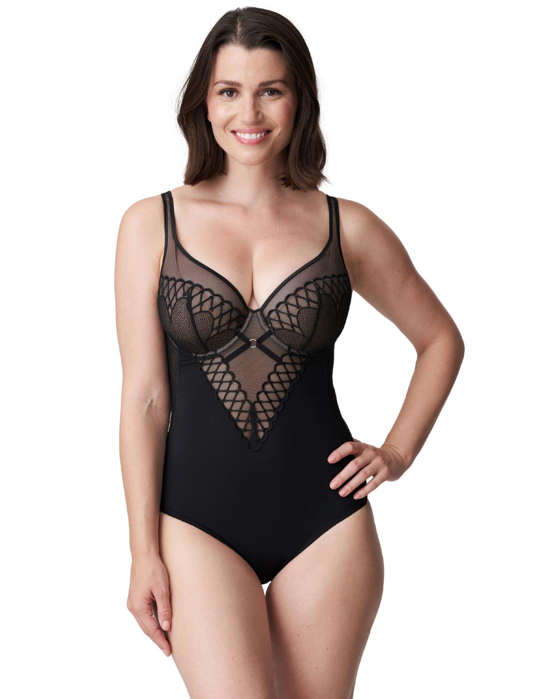 This body from the Vya collection is seductive, elegant and crafted from Prima Donna's utmost luxurious fabrics. The classic design is enhanced with semi-sheer tulle that seductively shows a glimpse of skin beneath through the sexy lattice embroidery. The opaque front offers modesty and the moderate rear coverage creates a comfortable fit. The adaptable shoulder straps allow you to wear as a classic over the shoulder look or sporty crossed back.  Sexy semi-sheer tulle Luxurious embroidery detail Adaptable shoulder straps Moderate rear coverage Full-cup coverage Hook and eye closure Country of origin: Tunisia Composition: 47% Polyamide &pipe; 29% Elastane &pipe; 22% Polyester &pipe; 2% Cotton  Listed in UK sizes  54036-96736-1253329 0463332 Body