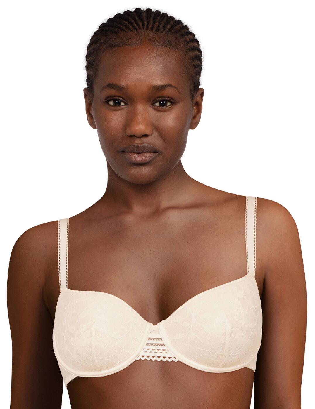 Extra special piece to add to your everyday lingerie essentials with the classic Marta collection by Passionata by Chantelle. This elegant underwired half cup balconette style spacer bra offers a combination of style and comfort as the cups use a Spacer complex that allows the skin to breathe. Stylish elastic edge at the centerfront and a full back band all in lace that subtly reveals the skin. Fully adjustable straps with a hook & eye fastening. Complete the look with matching lingerie available from the classic Marta collection by Passionata by Chantelle.  Luxurious everyday bra Comfortable spacer design Stylish tulle back Half-cup t-shirt bra Hook and eye fastening Fully adjustable shoulder straps Non-padded, moulded cups Underwired Country of origin: Vietnam Composition: Lace: 92% Nylon &pipe; 8% Elastane Composition: Lace middle: 80% Nylon &pipe; 20% Elastane Composition: Knit: 92% Polyester &pipe; 8% Elastane Listed in UK sizes  62035-107306-1421407 P46H60 Half Cup Bra