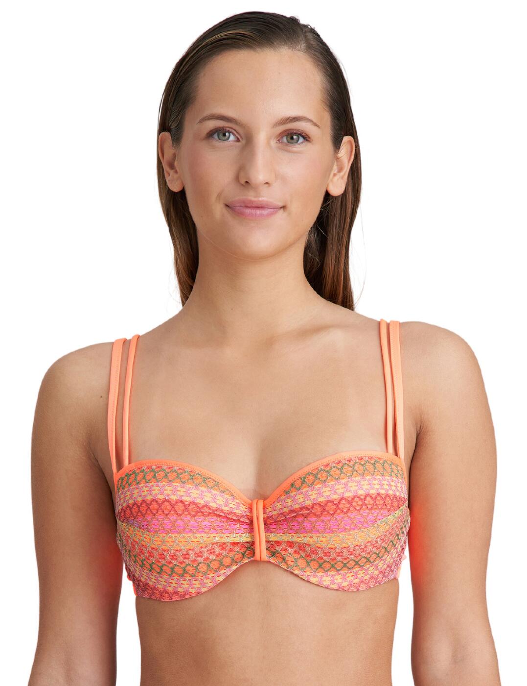 Take your beach game to the next level with the Marie Jo Almoshi balcony bikini top this season. This beautiful balcony bikini top is designed with every luxurious detail in mind. Crafted from soft and comfortable materials, it features padded cups for the desired shape and an underwire for gentle support. With a clip fastening at the back and adjustable shoulder straps that can also be worn as a halter, you will be looking stunning while feeling completely comfortable. Take advantage of its unique pattern and find yourself some matching swimwear to create a complete look today! Enjoy your time on the beach or by the pool with added confidence knowing you have chosen one of the most luxurious swimwear collections around.  Beautiful balcony bikini top Padded cups Underwired Clip fastening Adjustable shoulder straps that can also be worn as a halter Stunning pattern Matching swimwear available Composition: 74% Polyester &pipe; 13% Polyamide &pipe; 6% Viscose &pipe; 5% Elastane &pipe; 2% Metal fibre Listed in UK sizes  62978-108410-1438556 1007119 Padded Balcony Bikini Top