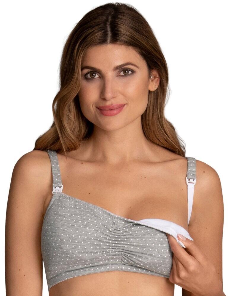 Make breastfeeding a breeze while also looking stylish in this nursing bra from the Miss Debby range by Anita. This bra is adorned in pretty polka dots and features a crop-top style which can be adjusted with a drawstring in the centre to form more rounded cups for a more feminine look. This bra is non-wired for a very natural fit and feel and is also non-padded. The nursing clips on the straps are discreet and allow you to open the cup, making breastfeeding a breeze. The straps are adjustable, allowing you to find an individual fit, and this bra secures at the rear with a hook and eye closure.  Stylish, contemporary design Cute polka dot Drawstring in the centre can be adjustable Non-wired, non-padded Nursing clips make breastfeeding a breeze Adjustable straps Secures at the rear with hook and eye Composition: 58% Nylon &pipe; 29% Cotton &pipe; 10% Polyester &pipe; 3% Elastane Listed in UK sizes  46398-85140-1134363 5091 Nursing bra
