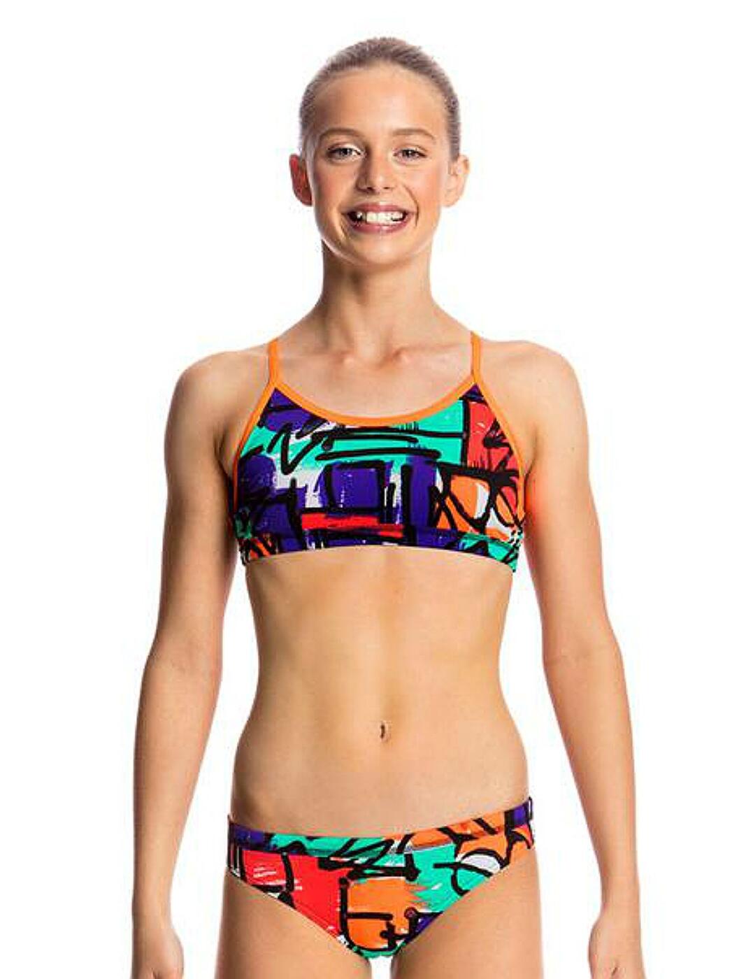 Introducing Funkita swimwear for girls, offering truly funky and fabulous poolside attire! Made from super soft fabric and decorated in an all-over quirky print, this bikini set this bikini set is sure to make you stand out amongst your friends!  Fun and funky design! Comfortable and contemporary fit and feel Chlorine resistant Covered in a fun and girly print! Crop top is firm fitting and non-wired, suited to sporty girls! Crop top is a secure fit with underbust and waist elastic Drawcord on the bikini brief for optimal fit! Bikini brief offers good rear coverage to preserve modesty All sizes are in AGE Composition:- 100% Polyester Listed in UK sizes  30831-57276 FS02G01814 Bikini Set