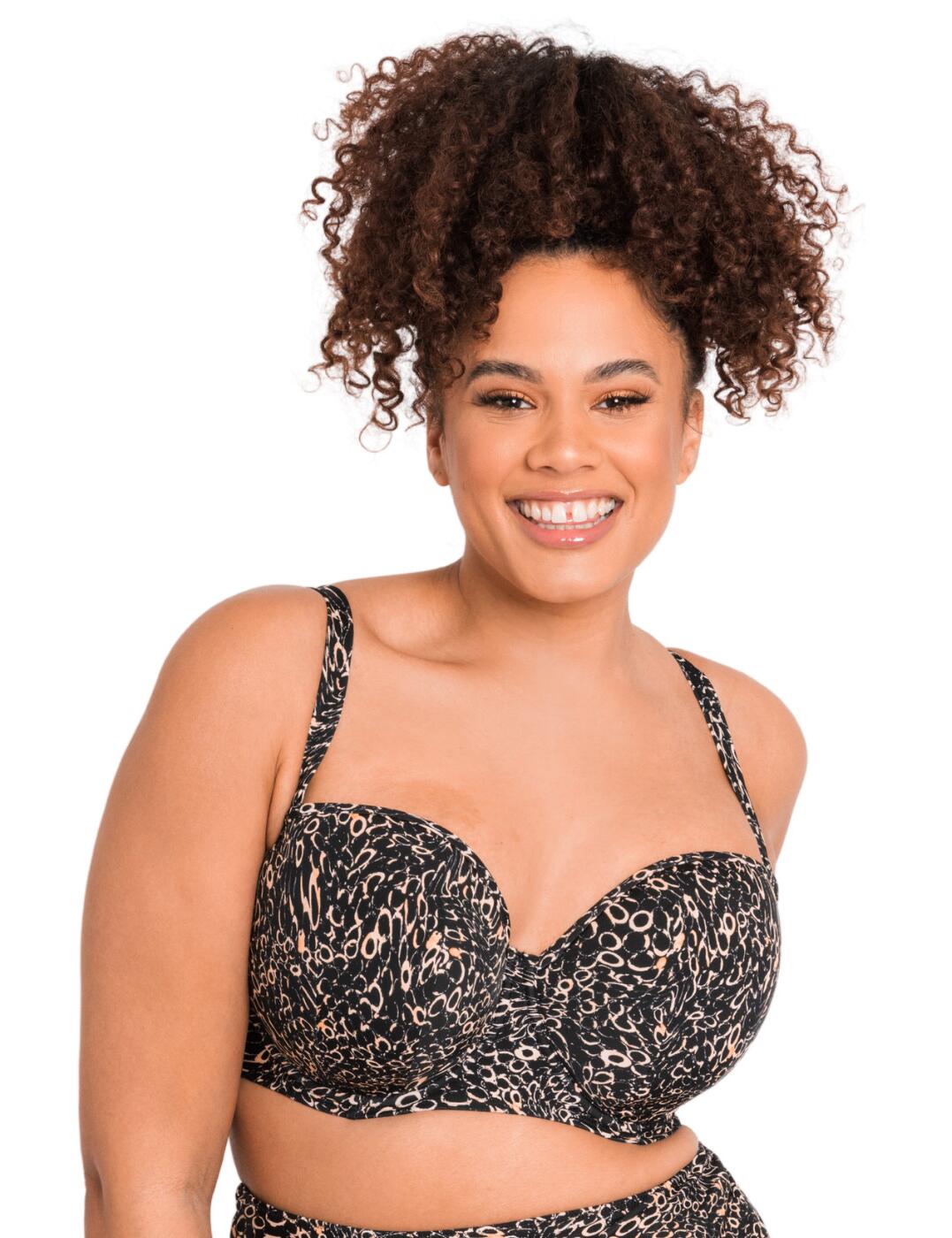 When you're looking for that classic bikini style to wear on the beach, this Eclipso balcony bra from Curvy Kate is a great choice. Curvy Kate is an expert in providing bras that fit the fuller busts and this bikini is not an exception. The design features underwired cups with slight padding on the bottom that will shape and support your natural curves, with the balcony style offering you a flattering look. The adjustable shoulder straps are also multiway, giving you the option to wear them traditionally over the shoulder, as a cross-back and even as a halterneck.  Balcony-style neckline Smooth elastic material Adjustable multiway shoulder straps Swimwear clicker back closure Underwired Padded bottom cups Wear with matching coordinates Country of origin: China Listed in UK sizes  54178-96895-1254993 CS022306 Balcony Bikini Top