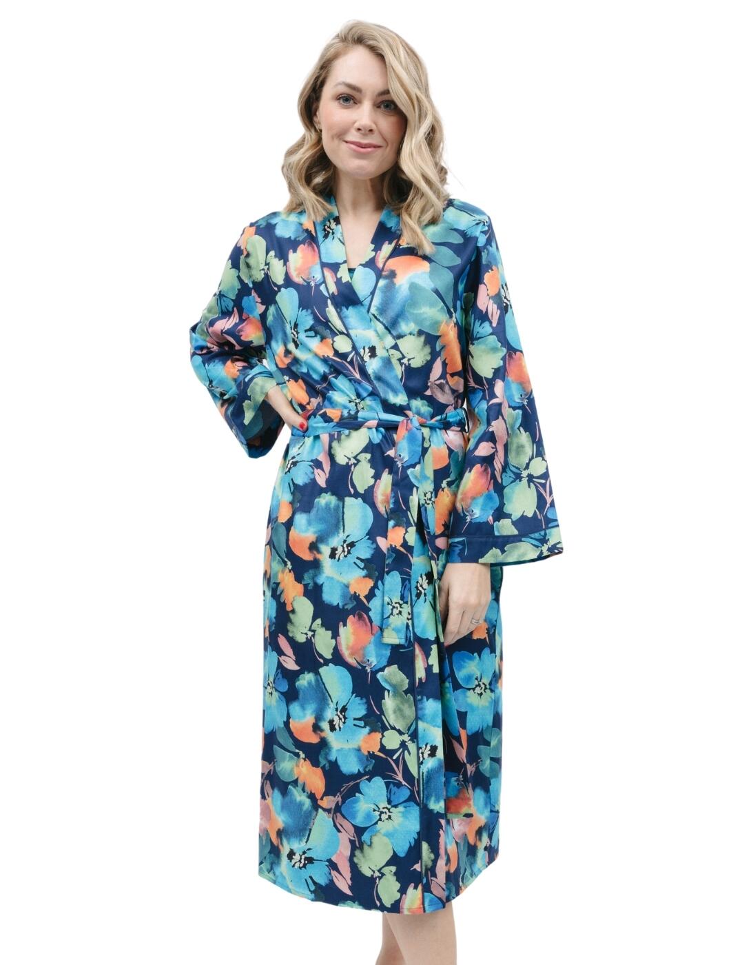 Searching for a new addition to your sleepwear wardrobe? Then look no further than the Cyberjammies Bea floral print long dressing gown! Designed with superior comfort in mind, this stylish gown features a vibrant floral print pattern with contrasting backgrounds and trimmings for a trendy loungewear look. The wrap-front kimono style design makes it both elegant and warm while two side pockets add extra convenience. Whether you’re lying around the house or ready for a good night’s sleep, the Cyberjammies Bea dressing gown is sure to keep you looking stylish, comfortable and cosy. Don't forget to shop the matching coordinates to complete your look!  Long sleeve robe Vibrant floral print pattern Contrasting piping trim Front and back length: 120cm Wrap over front with tie fastening Side pockets Country of origin: India Composition: 60% Cotton &pipe; 40% Modal Listed in UK sizes  9739-8 9739 Dressing Gown