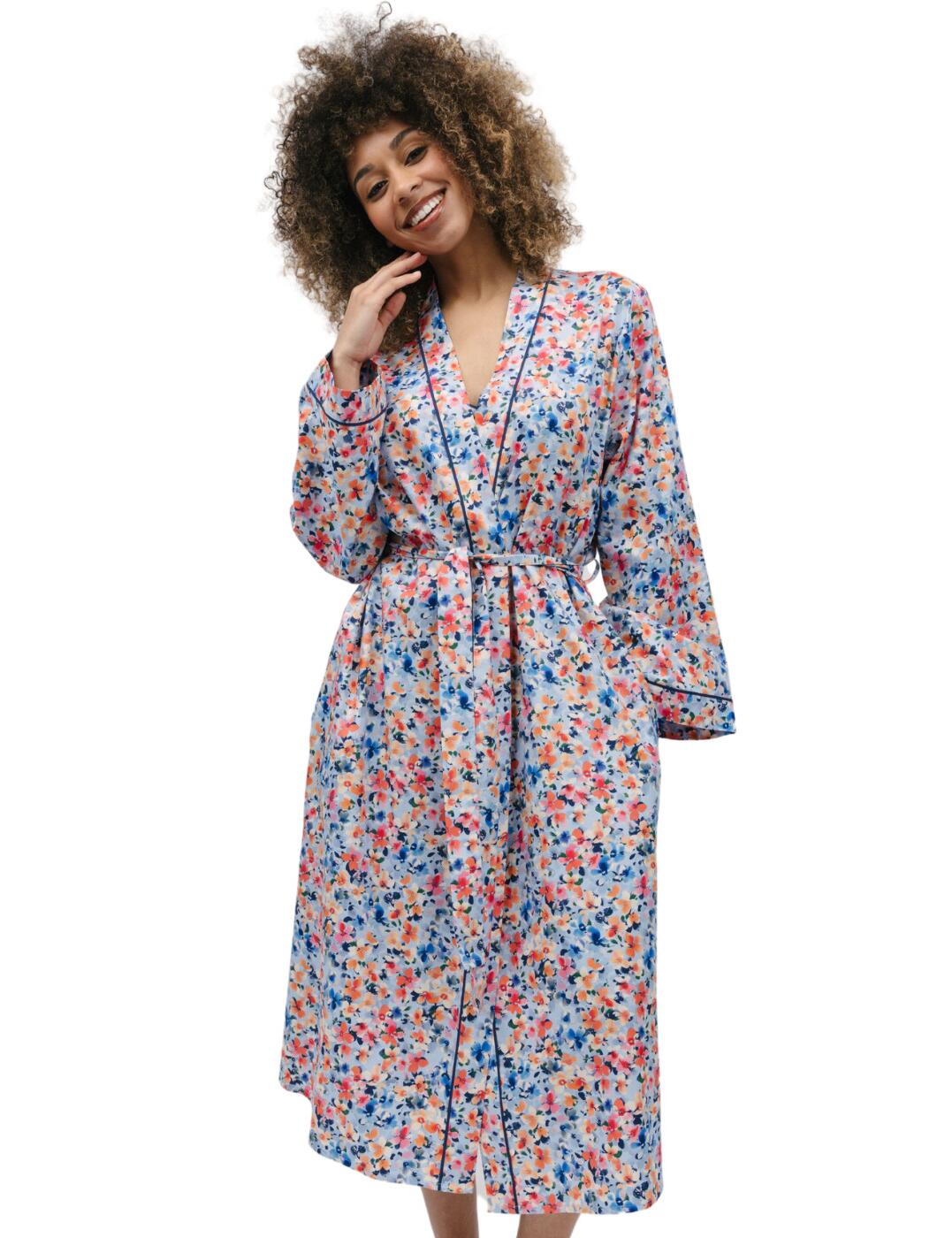 Welcome to the ultimate relaxation piece with the Cyberjammies Bea range in ditsy floral print. This long dressing gown is ideal for those searching for stylish and comfortable sleepwear. The wrap-front kimono style, tie waist and trim adds elegance while the two side pockets make it practical for those lazy days after sleeping in. Whether you’re catching up on your favourite TV shows or curling up with a good book, you can do it in style by wearing your new favourite sleepwear piece. Plus, don't forget to snap up the matching Bea ditsy floral print coordinates to add to your collection!  Dressing gown Tie waist Kimono wrap front style Long sleeve Ditsy floral print Front and back length: 120cm Matching coordinates available Country of origin: India Composition: 60% Cotton &pipe; 40% Modal Listed in UK sizes  9744-8 9744 Dressing Gown