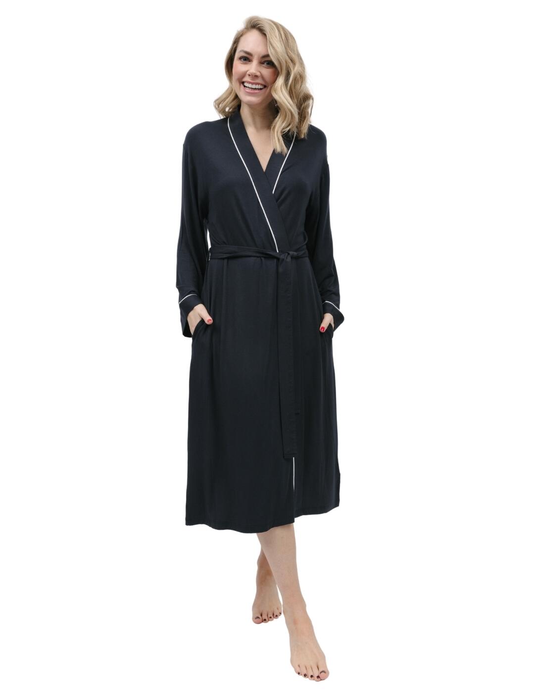 Get ready to relax in style and comfort with the new Cyberjammies Nicole dressing gown! This beautiful kimono-style gown is perfect for both lounging around the house and getting ready for bed. Crafted from a lightweight jersey fabric, this gown wraps beautifully around your body to give you that extra bit of cosy warmth throughout the night. It features contrast trimming along the edges, as well as a self-fabric belt for keeping everything in place. Plus, two pockets make it convenient for carrying all sorts of essentials with you while you lounge. And paired with matching coordinates from Cyberjammies, you'll be sure to look your best even while taking it easy at home.  Knit jersey dressing gown Wrap front Kimono style Contrast trimming Self-fabric belt Two side pockets Matching coordinates available Country of origin: India Composition: 95% Modal &pipe; 5% Elastane Listed in UK sizes  9881-8 9881 Dressing Gown