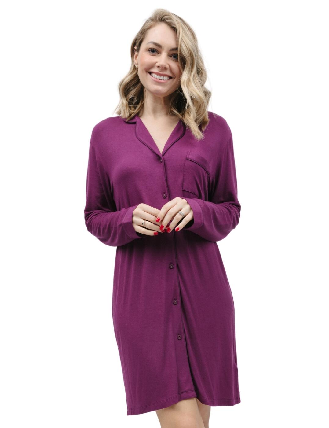 Experience a restful night’s sleep in Cyberjammies Carina revere jersey nightshirt. With vibrant colour, contrasting trim and a revere collar, this stunning nightshirt exudes classic elegance and sophistication. With long sleeves for warmth and coverage, breathable fabric to ensure maximum comfort, and a pocket for practicality this nightshirt has it all! Finished with front fastening buttons for ease and style, we are sure that you will love our Cyberjammies Carina revere jersey nightshirt. Don't forget to shop the matching coordinates and enjoy dreaming the night away in absolute bliss.  Nightshirt Modal-covered button front fastening Front pocket Knee length Front and back length: 95cm Ultra-soft fabric Long sleeved Matching coordinates available Country of origin: India Composition: 95% Modal &pipe; 5% Elastane Listed in UK sizes  9794-8 9794 Nightshirt