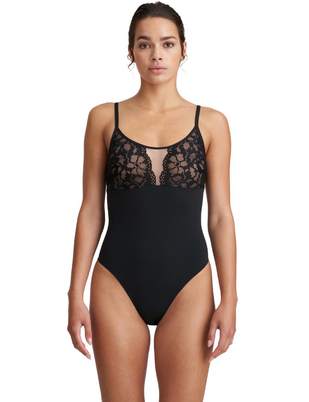 Indulge your inner seductress with this luxurious body from the Suto collection by Marie Jo. The elegant design has an opaque middle for modesty and a cut-out back for an added flirty detail. The semi-sheer lace cups seductively shows a glimpse of skin and the rounded neckline offers full cup coverage. A clasp back fastening creates a secure fit and the adjustable straps allow for the perfect individual fit. Integrated elastic offers the breast extra support without uncomfortable underwiring.  Elegant sexy style Modest opaque middle Flirty semi-sheer lace cups Sexy cut-out back Back clasp fastening Non-wired Adjustable shoulder straps Country of origin: Tunisia Composition: 74% Polyamide &pipe; 24% Elastane &pipe; 2% Cotton  Listed in UK sizes  54248-96965-1257241 0422184 Body