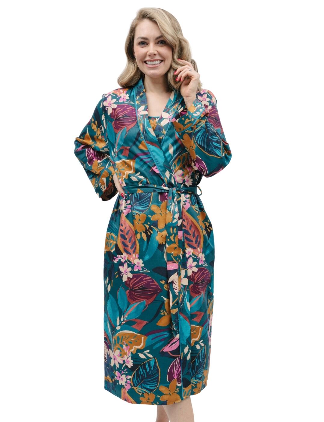 Stay snug and stylish during your downtime with the Cyberjammies Maple long dressing gown. This luxurious women's dressing gown features a kimono-style wrap front and an adjustable tie waist for a cosy yet fashionable fit. It comes with long sleeves and is made of a luxurious fabric that will keep you comfortable and relaxed all night. The elegant pattern and side pockets give it extra appeal, while the front and back length of 120cm allow for an ideal fit. Whether you're curled up on the couch or lounging in bed, the Cyberjammies Maple long dressing gown is the perfect addition to your cosy nightwear selection.  Long dressing gown Kimono style Wrap front Tie waist Luxurious feel Elegant pattern Side pockets Long sleeves Front and back length: 120cm Country of origin: India Composition: 60% Cotton &pipe; 40% Modal Listed in UK sizes  9895-8 9895 Dressing Gown