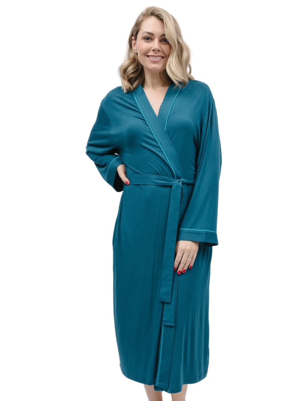Immerse yourself in a world of luxury with the Cyberjammies Maple jersey dressing gown. Made from ultra-cozy fabric, this timeless piece boasts an elegant plain opaque design and contrasting trims. The wrap front, tie waist, kimono-style and long sleeves combine to create an undeniably feminine look. On chilly nights, simply slip into your dressing gown and relax in pure comfort. There are even two side pockets for added convenience. Measuring 115cm in both front and back length, this piece will provide coverage while still allowing plenty of freedom to move around. If you’re looking for cosy nightwear that exudes sophistication, then the Cyberjammies Maple jersey dressing gown is the perfect choice!  Soft long dressing gown Luxurious feel and design Elegant plain opaque design with contrasting trim Timeless look Kimono style Wrap front Tie waist Side pockets Front and back length: 115cm Country of origin: India Composition: 95% Modal &pipe; 5% Elastane Listed in UK sizes  9909-8 9909 Dressing Gown