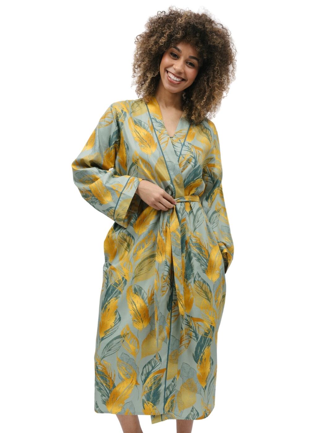 The Cyberjammies Hannah long dressing gown is perfect for anyone seeking out luxurious and cosy nightwear. This dressing gown is made with a soft feel fabric that is designed to envelop you in comfort. The kimono style with a tie waist wrap front is flattering and allows you to move freely. With a front and back length of 120cm, the dressing gown creates a beautiful flow as you move. The long sleeves make sure your hands remain warm as you spend the day in your favourite piece. The luxurious design of this dressing gown will ensure you stay cosy and comfortable all day long.  Long dressing gown Kimono style Soft feel with luxury design Tie waist wrap front Flowly flattering style Long sleeves Front and back length: 120cm Country of origin: India Composition: 60% Cotton &pipe; 40% Modal Listed in UK sizes  9754-8 9754 Dressing Gown