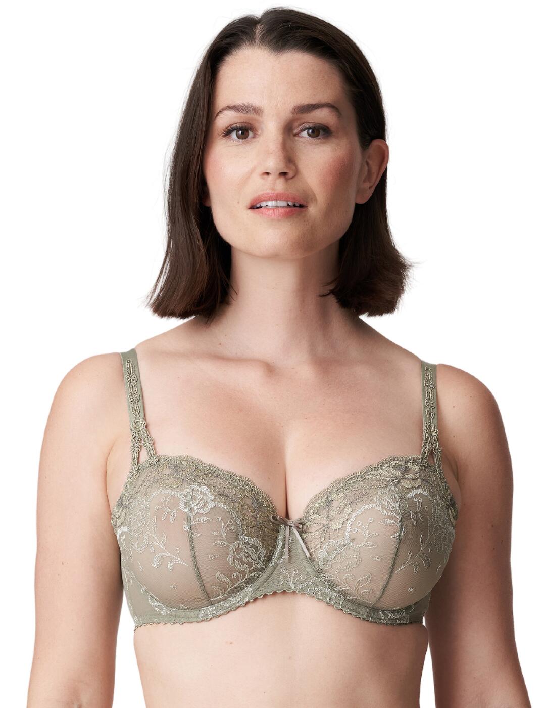 Update your lingerie collection with this Prima Donna Delight balcony bra. This bra features a sheer cup with delicate embroidery detailing that continues up the straps. It has balcony shaped cups that enhance your cleavage whilst the built-in underwire creates amazing support. The bra fastens at the back with a hook and eye closure and is combined with adjustable shoulder straps for the perfect individual fit. Finished off with a pretty centre bow. Team with luxurious coordinating briefs from the Delight range by Prima Donna.  Luxurious balcony bra Sheer cups with delicate embroidery detailing Balcony shape enhances your cleavage Underwired for support Fastens at back with hook and eye closure Adjustable straps for a perfect fit Cute centre bow Country of origin: Tunisia Composition: 70% Polyamide &pipe; 15% Polyester &pipe; 15% Elastane Listed in UK sizes  54293-97010-1257945 0162764/65 Balcony Bra