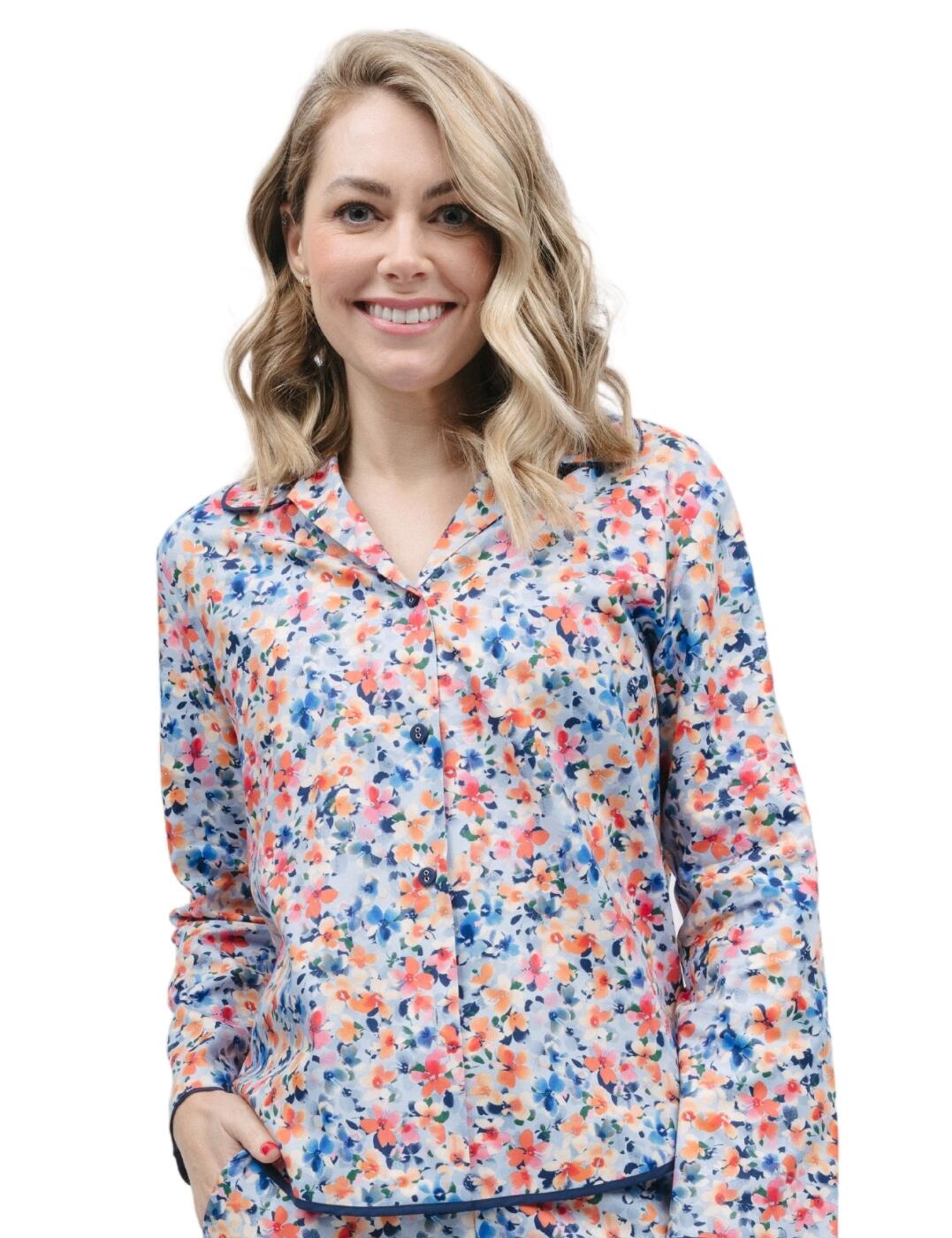 Welcome to dreamy comfort and the perfect laid-back personal style - the Cyberjammies Bea pyjama top! This floral top is suitable for bedtime but can easily be worn for lounging around on lazy days. It's an ideal way to look stylish and chic, all while feeling relaxed and comfortable. The flattering silhouette features a revere collar, long sleeves, and contrasting trimmed edges. Crafted from breathable fabric, you'll be sure to stay warm and cosy yet feel light all night long. Plus, with matching coordinates available, you can create the perfect look for restful nights of sweet dreams.  Relaxed pyjama top Button-down Revere collar Long sleeves Contrasting trimmed edges Shaped bottom hem creates a flatting silhouette Breathable fabrics Matching coordinates available Country of origin: India Composition: 60% Cotton &pipe; 40% Modal Listed in UK sizes  9740-8 9740 Loungewear