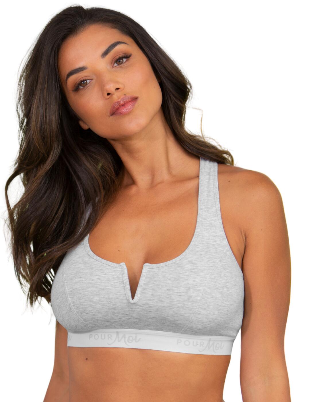 The Pour Moi Love to Lounge logo cotton non-wired crop top is a comfortable and stylish bra that is perfect for everyday wear. It is made from soft stretch cotton fabric and features a supportive elasticated underband. The V-cut out at the centre creates a plunge which showcases your cleavage. The racerback straps are non-adjustable and the bra is an easy pull-on style for a secure fit with minimal fuss. This crop top is perfect for women who are looking for a stylish and comfortable everyday lingerie option.  Crop top Cami shaped bralette Non padded Wireless V cut out at the centre creates a plunge Supportive elasticated branded underband Soft stretch cotton fabric Plain opaque design Pull-on style Non-adjustable racerback straps Country of origin: China Composition: 95% Cotton &pipe; 5% Elastane Listed in UK sizes  63182-108673-1443394 20106 Bralette
