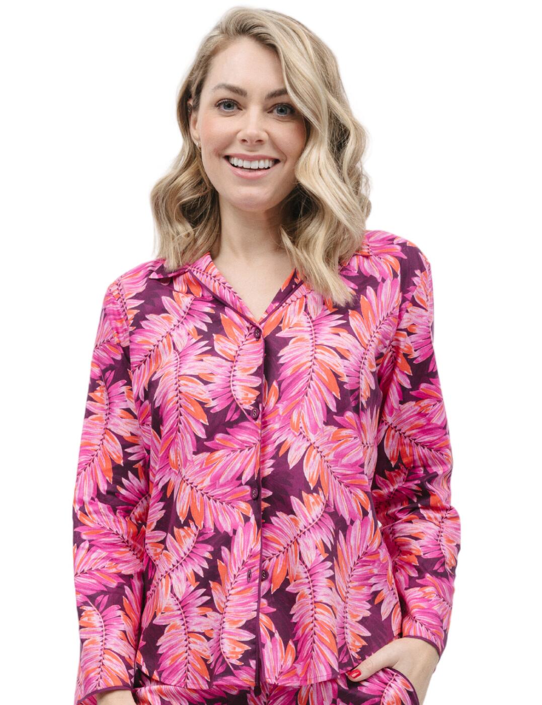 The Cyberjammies Carina pyjama top is the epitome of cosy nightwear. With its bold and playful design, it will provide an excellent touch of style and comfort at the same time. The elegant trims and timeless revere collar give the pyjama top a classic look that is sure to become a staple in your wardrobe. The long sleeves and button-down front are perfect for the colder months and the shaped bottom hem provides a flattering fit. If you're looking to complete the full look, the matching nightwear is also available - offering you the perfect set for your relaxing nights in.  Pyjama top Bold playful design Elegant trims Long sleeves Button down front Timeless revere collar Shaped bottom hem for a flattering fit Matching nightwear is also available Country of origin: India Composition: 60% Cotton &pipe; 40% Modal Listed in UK sizes  9779-8 9779 Pyjama Top