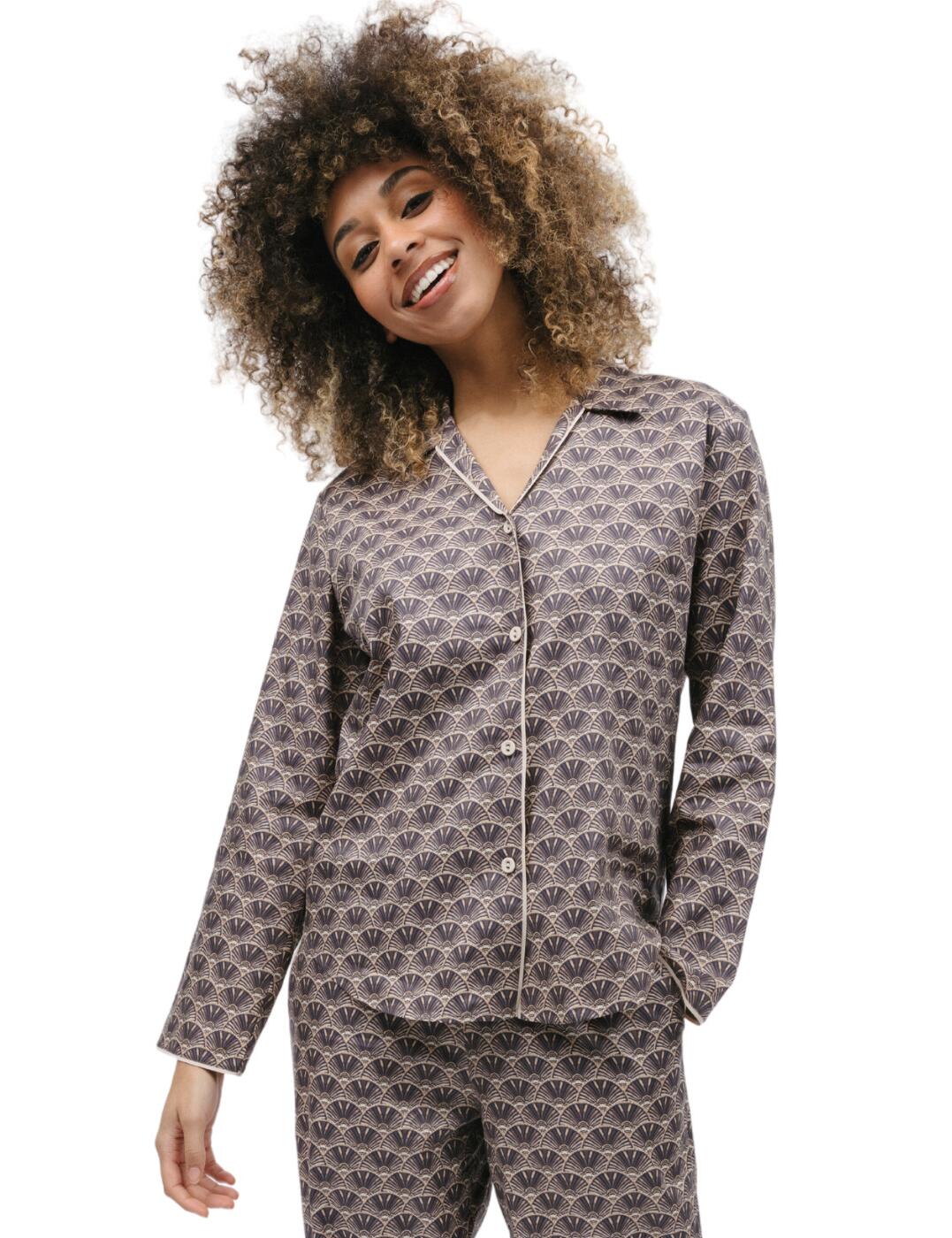Tired of searching for stylish sleepwear that can give you a good night's rest? Look no further! The Cyberjammies Lana pyjama top is here to make sure your sleepwear is as stylish as it is comfortable. Featuring long sleeves, button fastenings and a blouse style with adorned trims, this pyjama top is stylish and easy to slip on before bed. Plus, it comes with a stunning print, making sure all your friends know your sleepwear game is on point. And if that wasn't enough, you can even find matching sleepwear to complete the look. Let the Cyberjammies Lana pyjama top give you the perfect combination of fashion, comfort, and style as you rest for a peaceful night's sleep.  Stylish pyjama top Long sleeves Button fastenings Blouse style with adorned trims Stunning print Matching sleepwear available Country of origin: India Composition: 60% Cotton &pipe; 40% Modal Listed in UK sizes  9817-8 9817 Loungewear