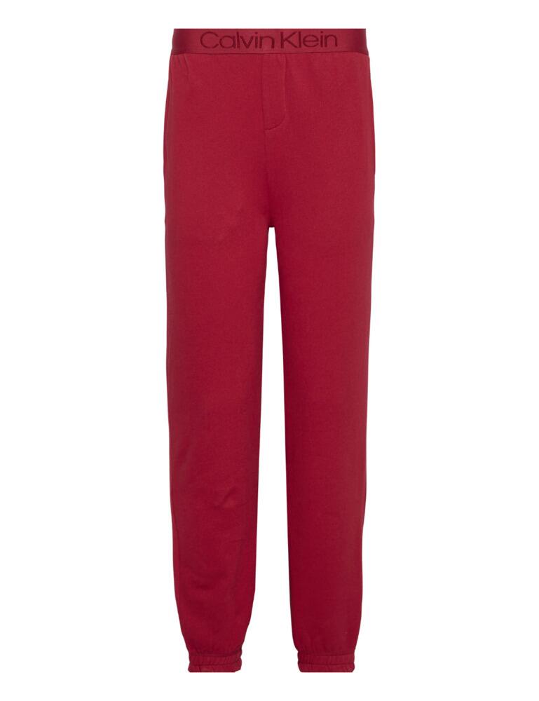 Designer loungewear at a great price! What's not to love. These Calvin Klein joggers are perfect for the cosy season and those lazy days in. Or can even double as outerwear all year round. The joggers are ultra-comfy made from high-quality polycotton fabric and have a soft fleece lining to keep you warm. The waistband is elasticated for comfort and features CK branding embroidered in a subtle thread. These comfy joggers have large pockets to hold your essentials.  Comfy designer joggers Fleece-lined Deep pockets Elasticated waistband Composition: 60% Cotton &pipe; 40% Polyester Listed in UK sizes  48768-88484-1187474 000QS6150E Joggers