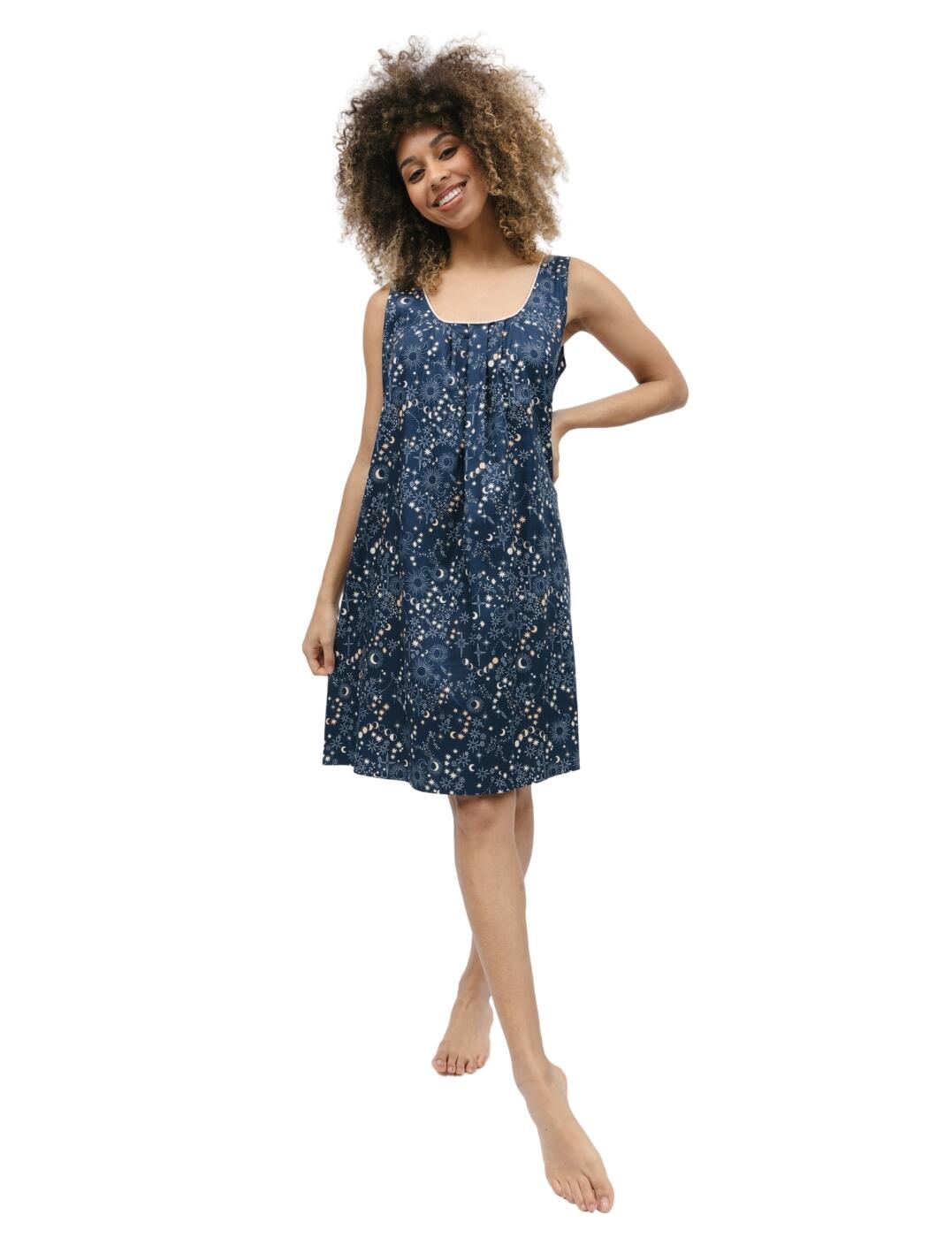 Make your nighttime dreams a reality with the Cyberjammies Cosmo short nightdress! The celestial print gives this nightdress an ethereal, dreamy look, and the soft and breathable materials are perfect for keeping you comfortable all night. The contrasting trimmed edges add a little extra detail and texture to the dress, while the wide shoulder straps add the perfect amount of support. Plus, the gently rounded neckline adds a flattering look to the top. Enjoy the relaxed loose fit and the front pleats that drape flatteringly down to the knee-length skirt.  Short nightdress Dreamy celestial print Soft and breathable materials Contrasting trimmed edges Wide shoulder straps Gently rounded neckline Relaxed loose fit Front pleats drape flatteringly down Knee length Country of origin: India Composition: 60% Cotton &pipe; 40% Modal Listed in UK sizes  9803-8 9803 Nightwear