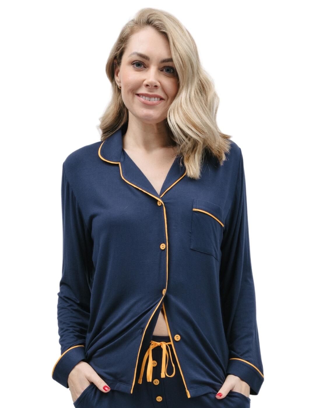Welcome to the world of comfort and style with the Cyberjammies Cosmo jersey pyjama top! You'll be amazed at how soft the jersey material feels against your skin as you slip into this piece. Featuring elegant contrasting trims, a revere collar, a single chest pocket, and a button-down closure, this top is not only fashionable but incredibly comfy too. The loose arms give you plenty of freedom to move around, plus give the overall fit a relaxed nighttime look. If you're looking to complete the look, matching pyjama coordinates are also available.  Jersey pyjama top Unparalleled softness Elegant contrasting trims Revere collar for a refined look Single chest pocket Button-down Loose arms Matching coordinates available Country of origin: India Composition: 95% Modal &pipe; 5% Elastane Listed in UK sizes  9805-8 9805 Loungewear