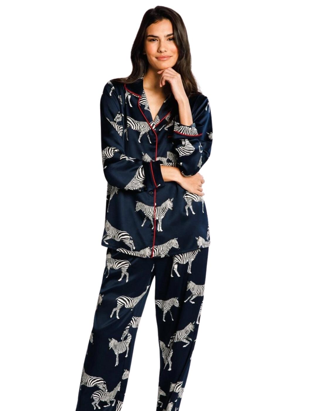 Sweet dreams await while wearing the Chelsea Peers satin long pyjamas this season. Made from sumptuous satin, you'll feel like you're sleeping on a cloud as soon as you slip into this heavenly pyjama set. The revere collar adds a touch of sophistication, while the cute zebra design adds a playful touch to your loungewear. The long sleeves provide just the right amount of coverage to keep you warm at night, while the pocket on the front adds a convenient touch for carrying your essentials. Contrasting piping adds a pop of colour and elegance, elevating your loungewear game to a whole new level. The full-length bottoms provide ample coverage, while the button-down fit allows you to easily adjust for your preferred fit.