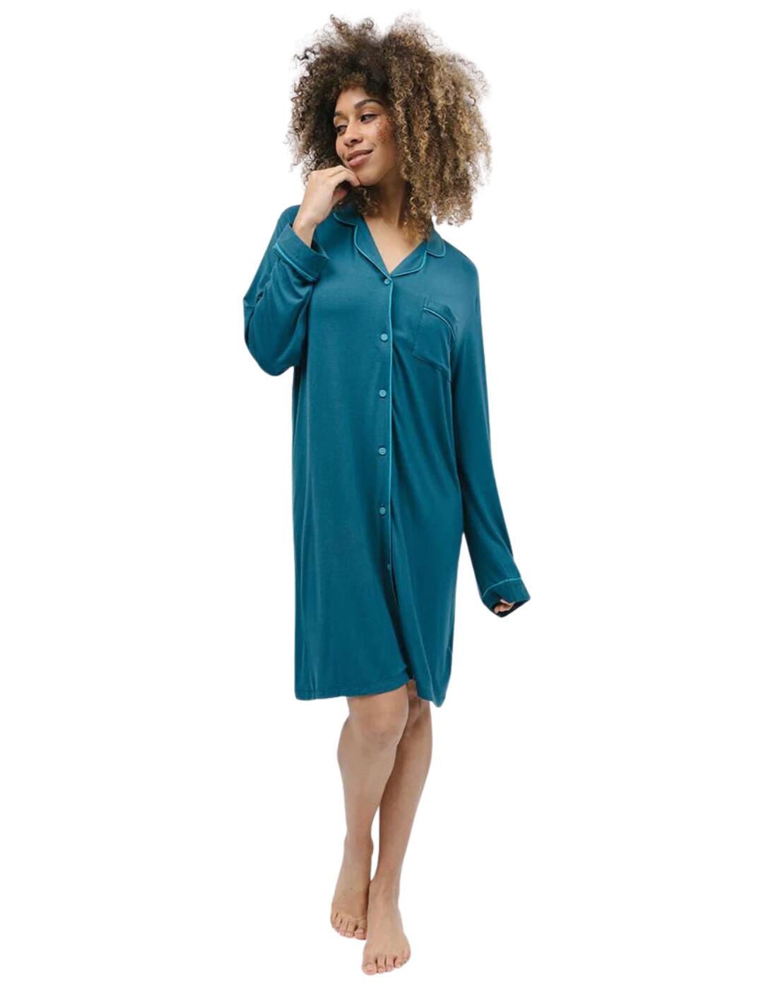Get ready for a night of sweet slumber with the Cyberjammies Maple nightshirt. This stunning jersey knit nightshirt is luxuriously soft against your skin, with contrasting trim edging that adds a bit of stylish flair. The revere collar and long sleeves will keep you warm, while the single chest pocket is the perfect place to keep your essentials. Conveniently placed buttons make for easy fastening and jumping into bed while the knee-length allows freedom to sleep however you like!  Jersey nightshirt Soft and gentle against the skin Contrasting trim edges Revere collar Long sleeves for warmth Single chest pocket Button-down fastening Knee-length Country of origin: India Composition: 95% Modal 5% Elastane Listed in UK sizes  9907-8 9907 Loungewear