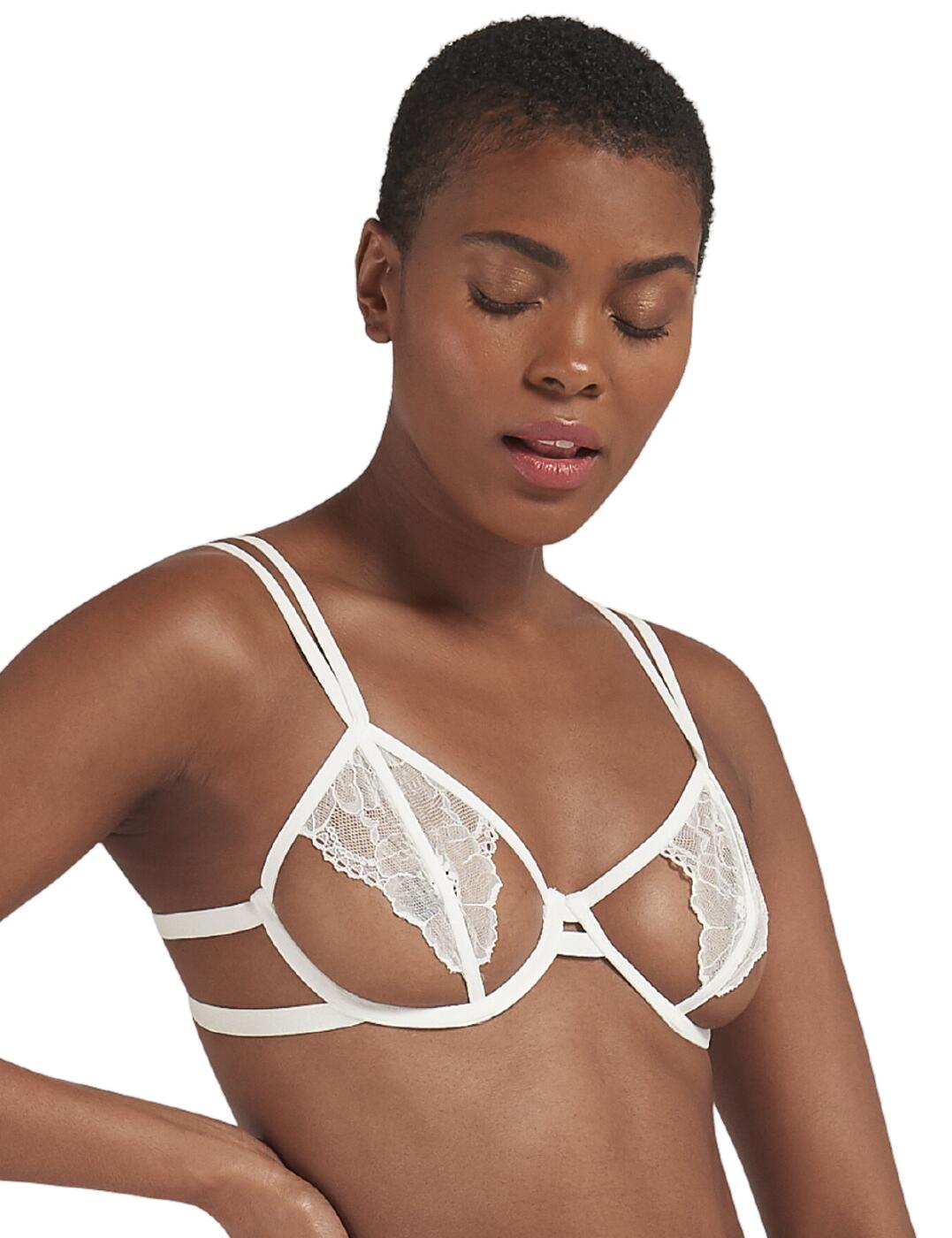 Reimagine seduction with Bluebella's Emerson's plunge cut-away bra. This playful number boasts stylish embroidered mesh cups with cut-out detailings on the lower cup for a truly provocative look. Fastened at the rear with a classic hook and eye closure for a secure fit. The shoulder straps boast a unique dual strap design which can be individually adjusted to tailor this piece to your own preference. Underwired cups allow you to embrace and elevate your natural curves for a truly irresistible look.