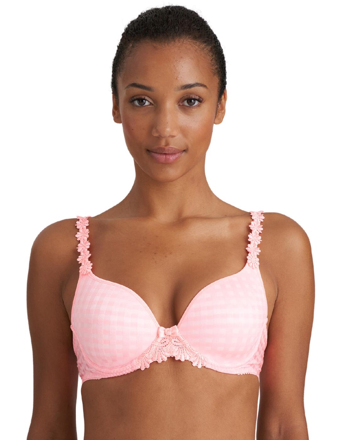 The much-loved Avero padded bra by Marie Jo is back bringing fun new colours, perfect for the upcoming summer season. This feminine piece is covered in a soft checkerboard print with gorgeous flower embroidery along the under band and straps, made complete with a mini bow in the centre. It has flattering heart-shaped cups with pre-shaped padded cups that enhance and showcases your bust. Like always with Marie Jo, it ensures a supportive and comfortable fit with underwiring, a silicone band across the back to help provide security along with a hook and eye closure and adjustable straps that can be worn as a halterneck. Pair with the matching bottoms that are also available for a flirty summer look.  Padded bra Heart-shaped cups Underwiring Supportive fit Checkerboard print with embroidery flower detailing Hook and eye closure Adjustable straps that can be worn as a halterneck Matching lingerie is also available Country of origin: China/Longnan Composition: 48% Polyester &pipe; 43% Polyamide &pipe; 9% Elastane Listed in UK sizes  58753-103241-1349571 0100416  Padded Bra